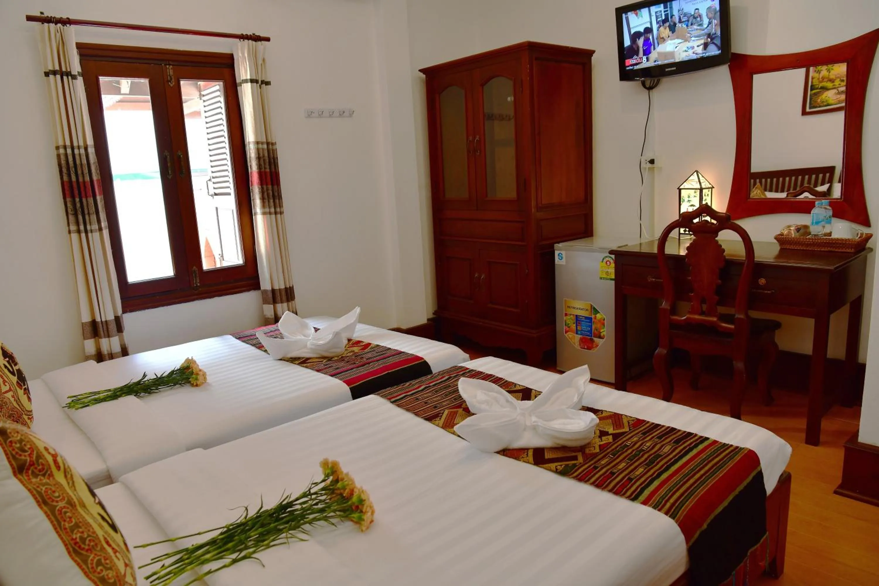 Photo of the whole room, Bed in Thatsaphone Hotel