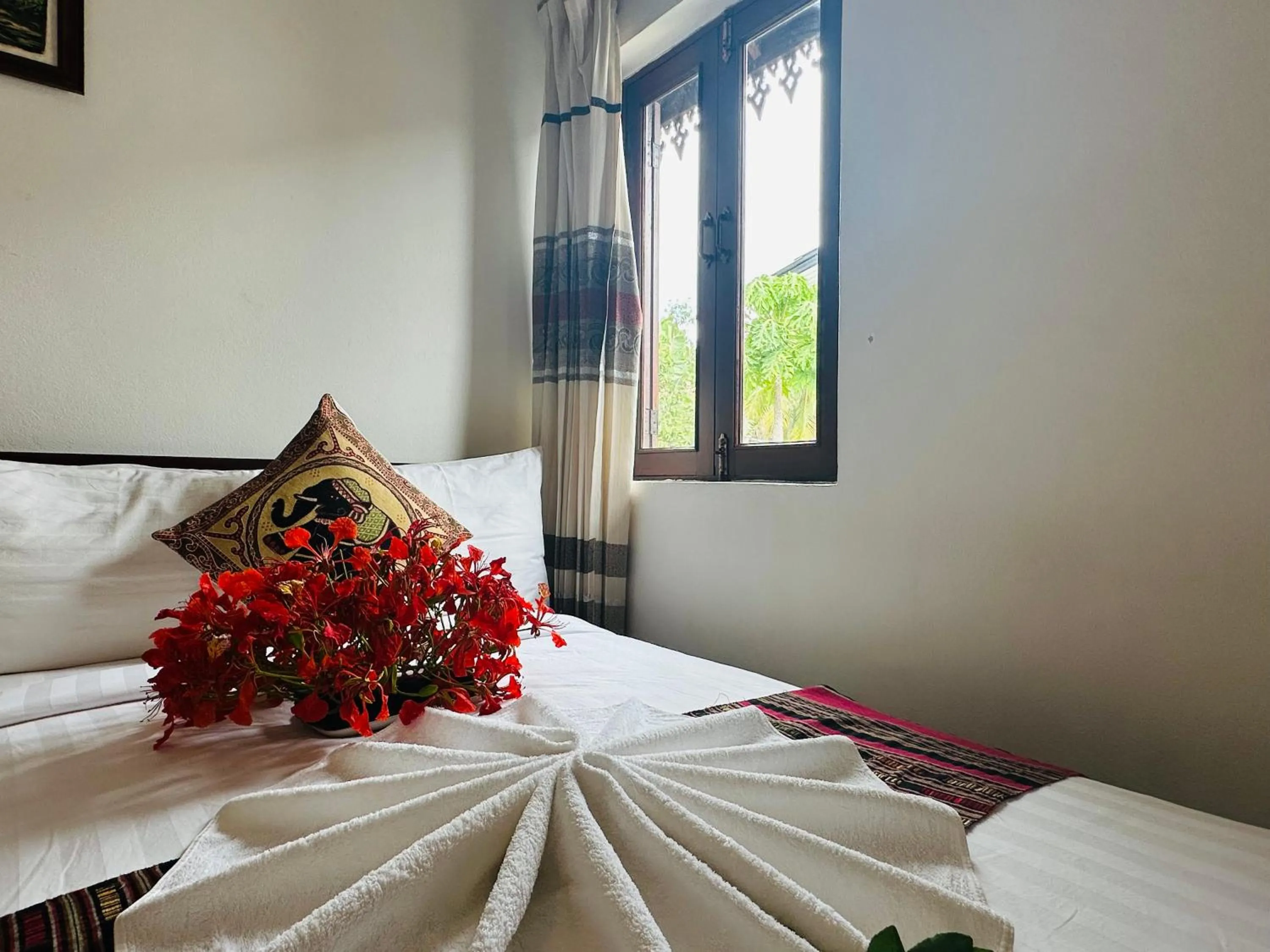 Bed in Thatsaphone Hotel