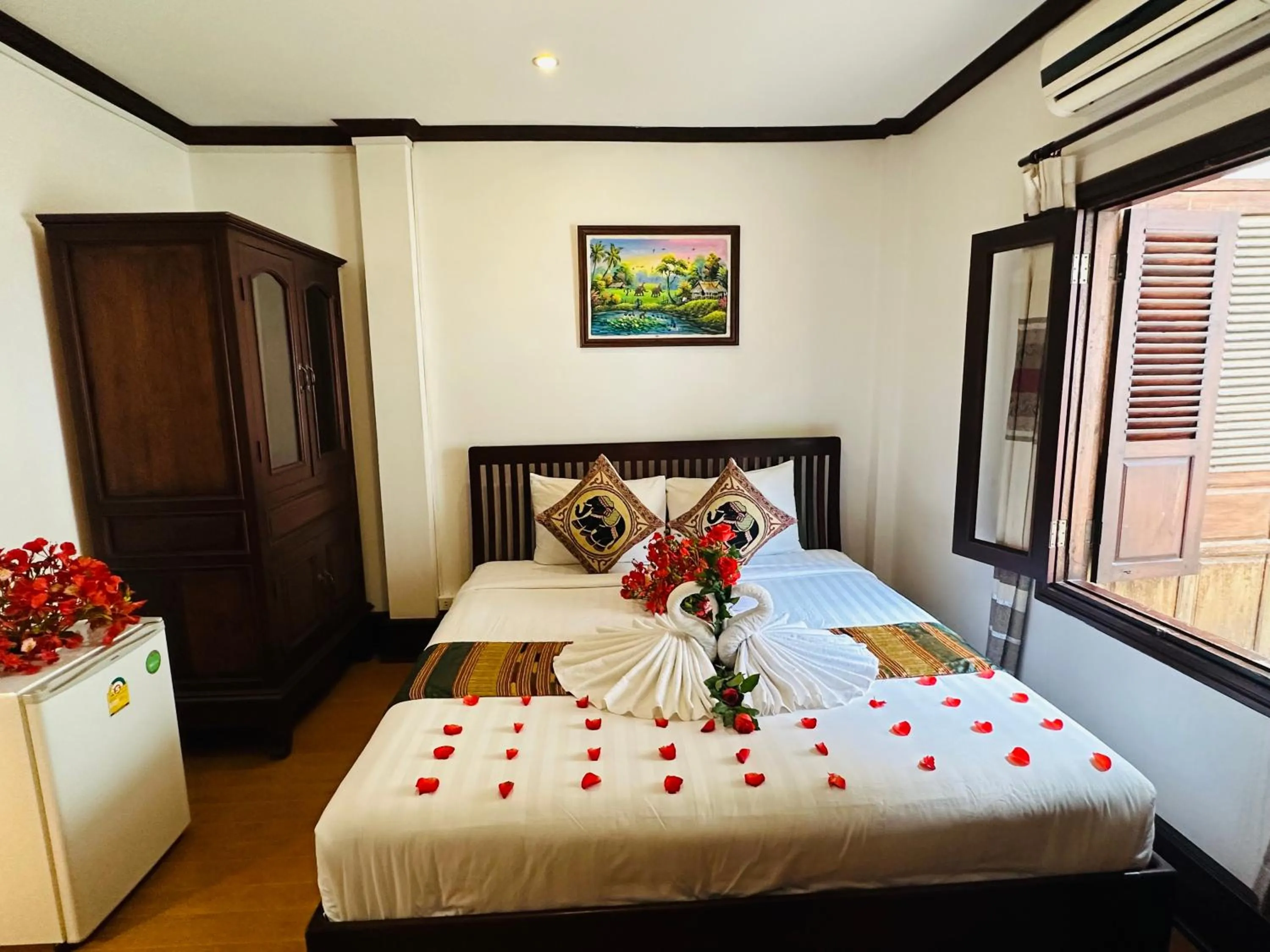 Bed in Thatsaphone Hotel