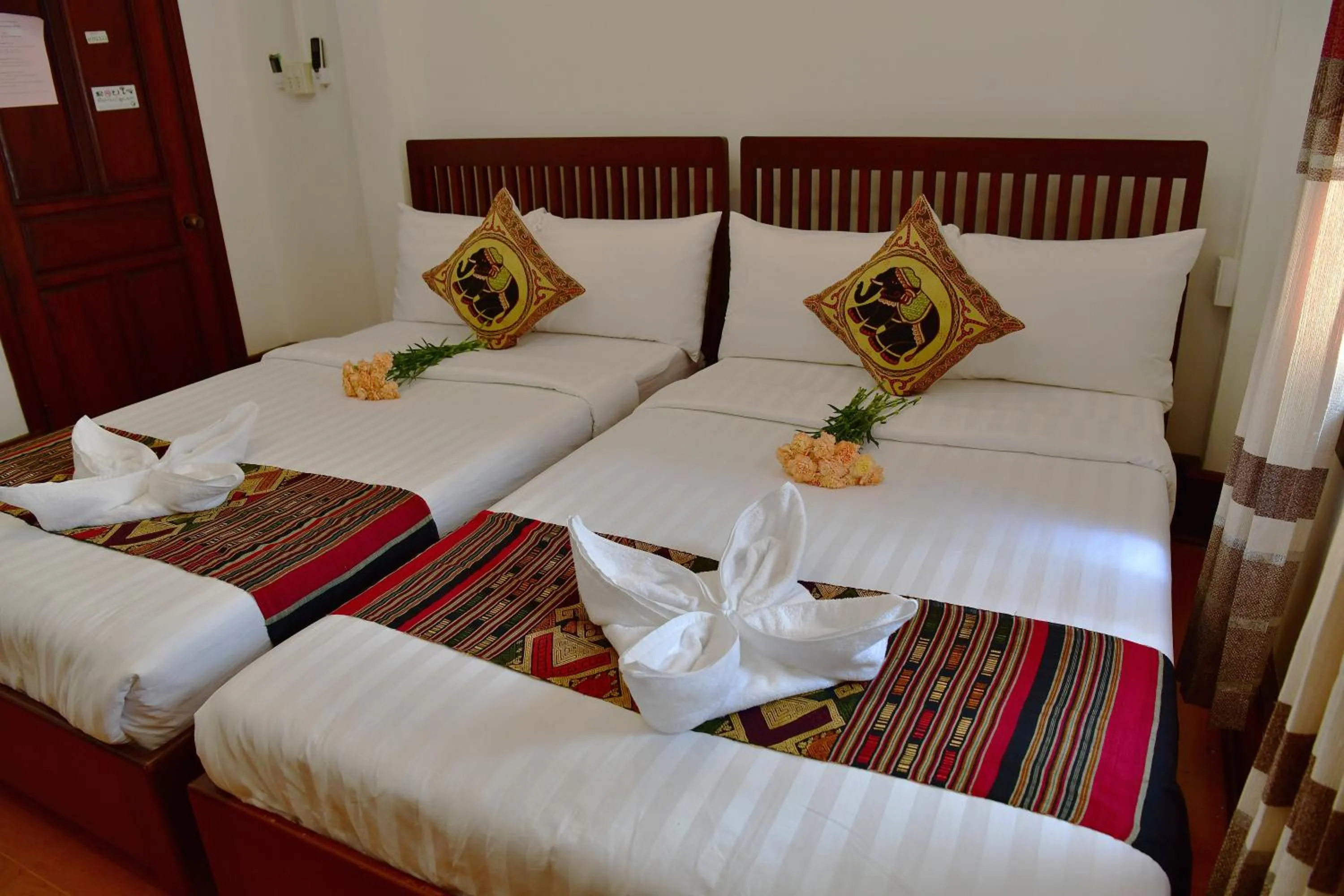 Bed in Thatsaphone Hotel