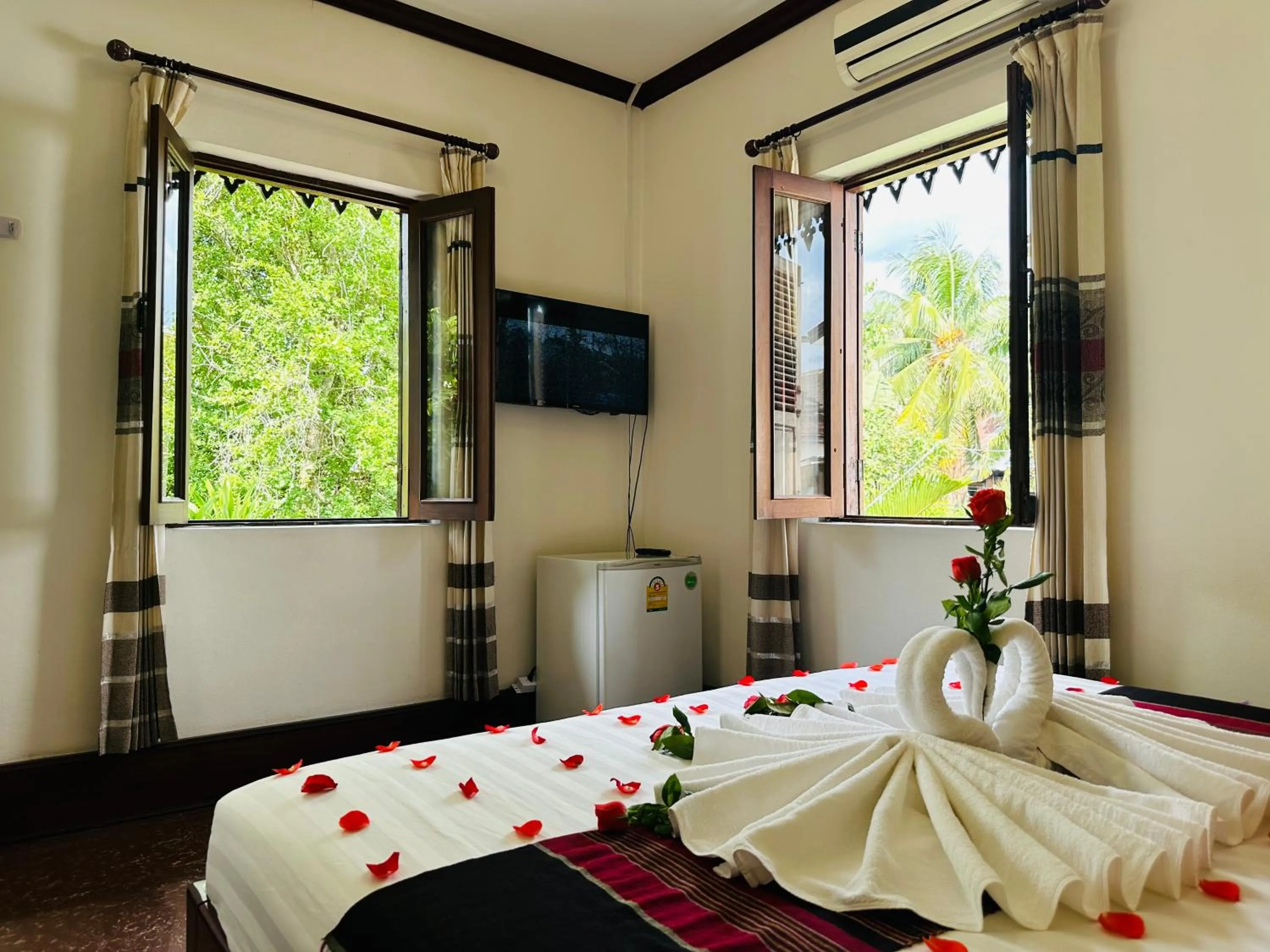 Bed in Thatsaphone Hotel