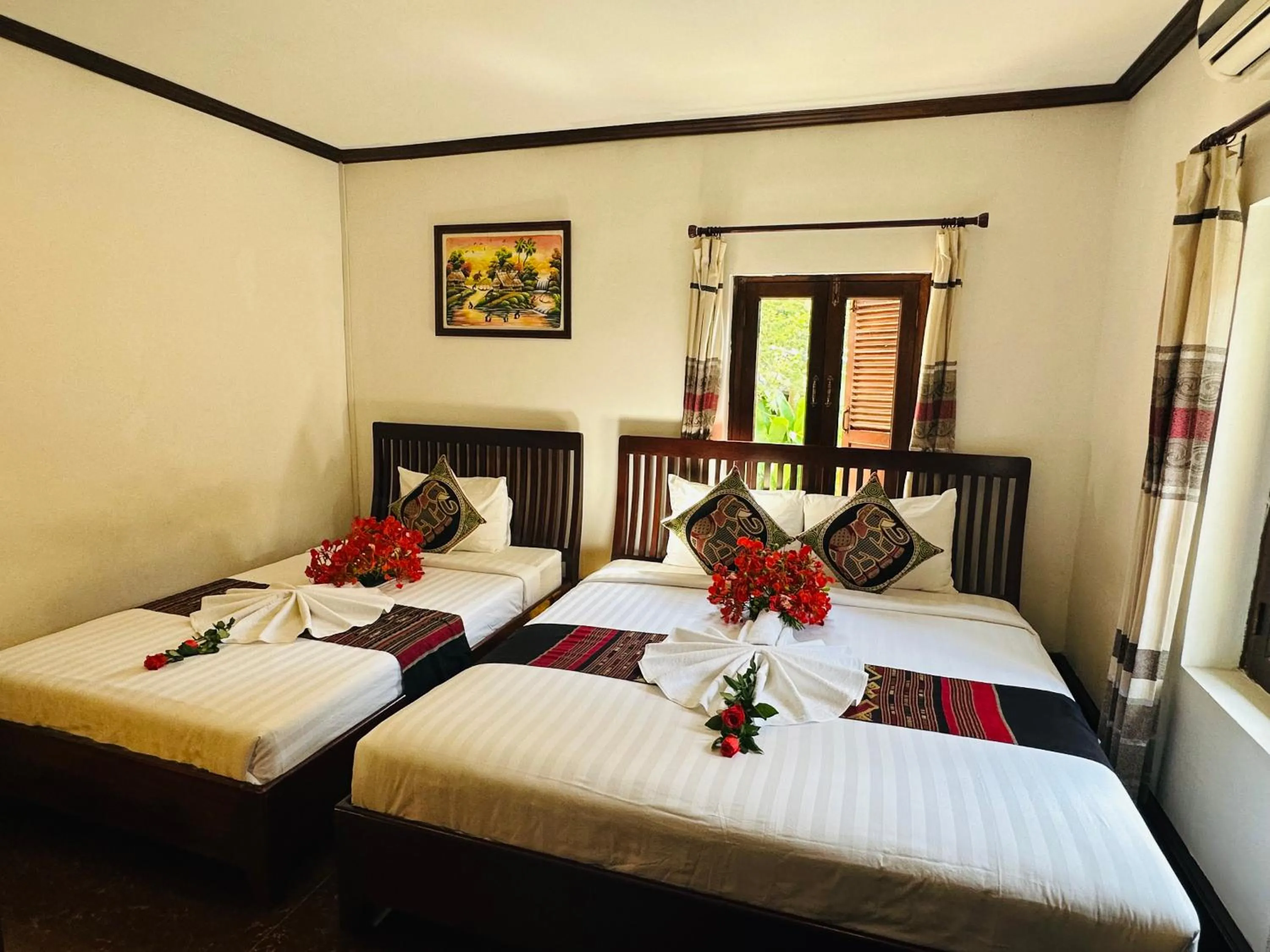 Bed in Thatsaphone Hotel