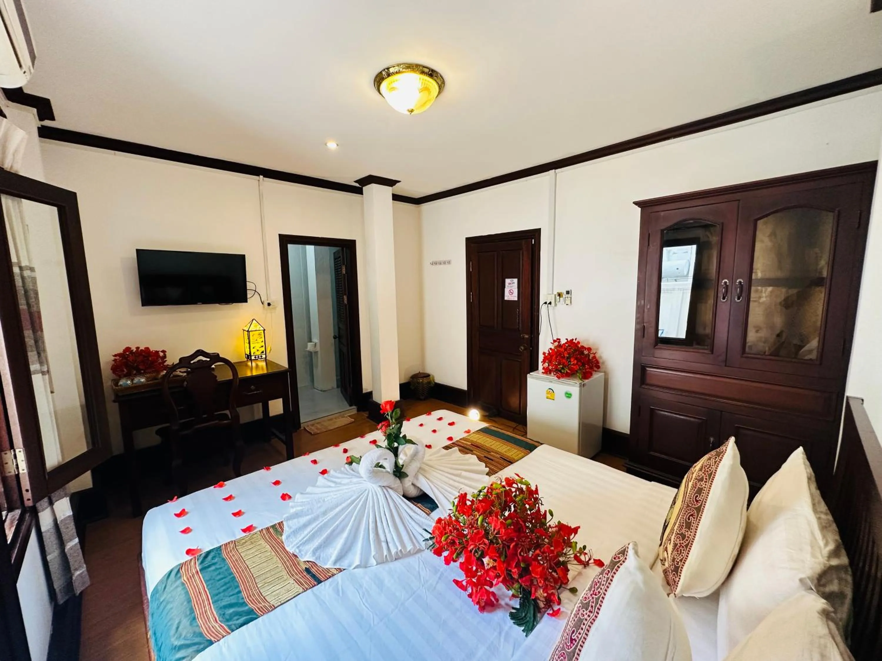 Bed in Thatsaphone Hotel