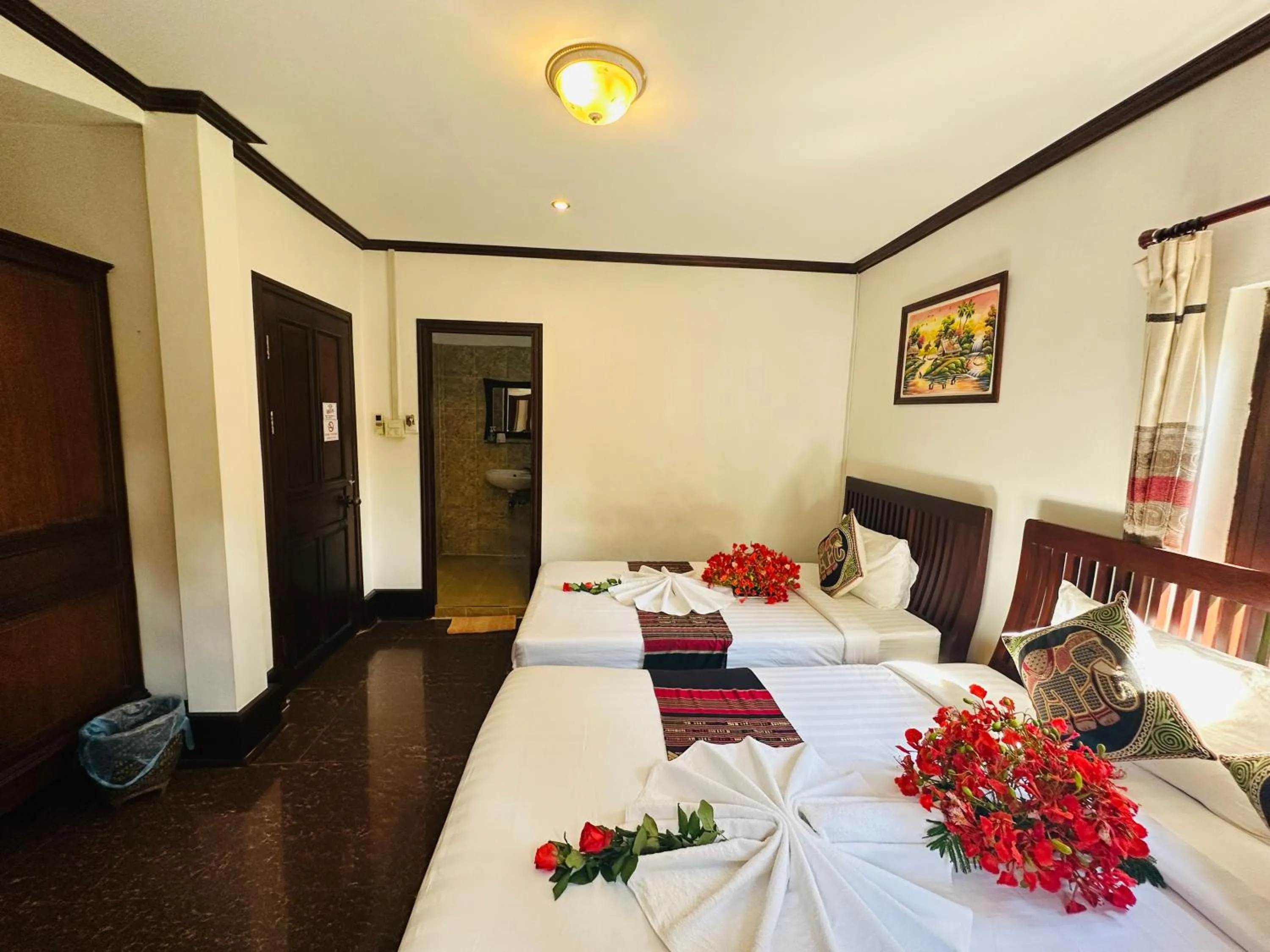 Bed in Thatsaphone Hotel