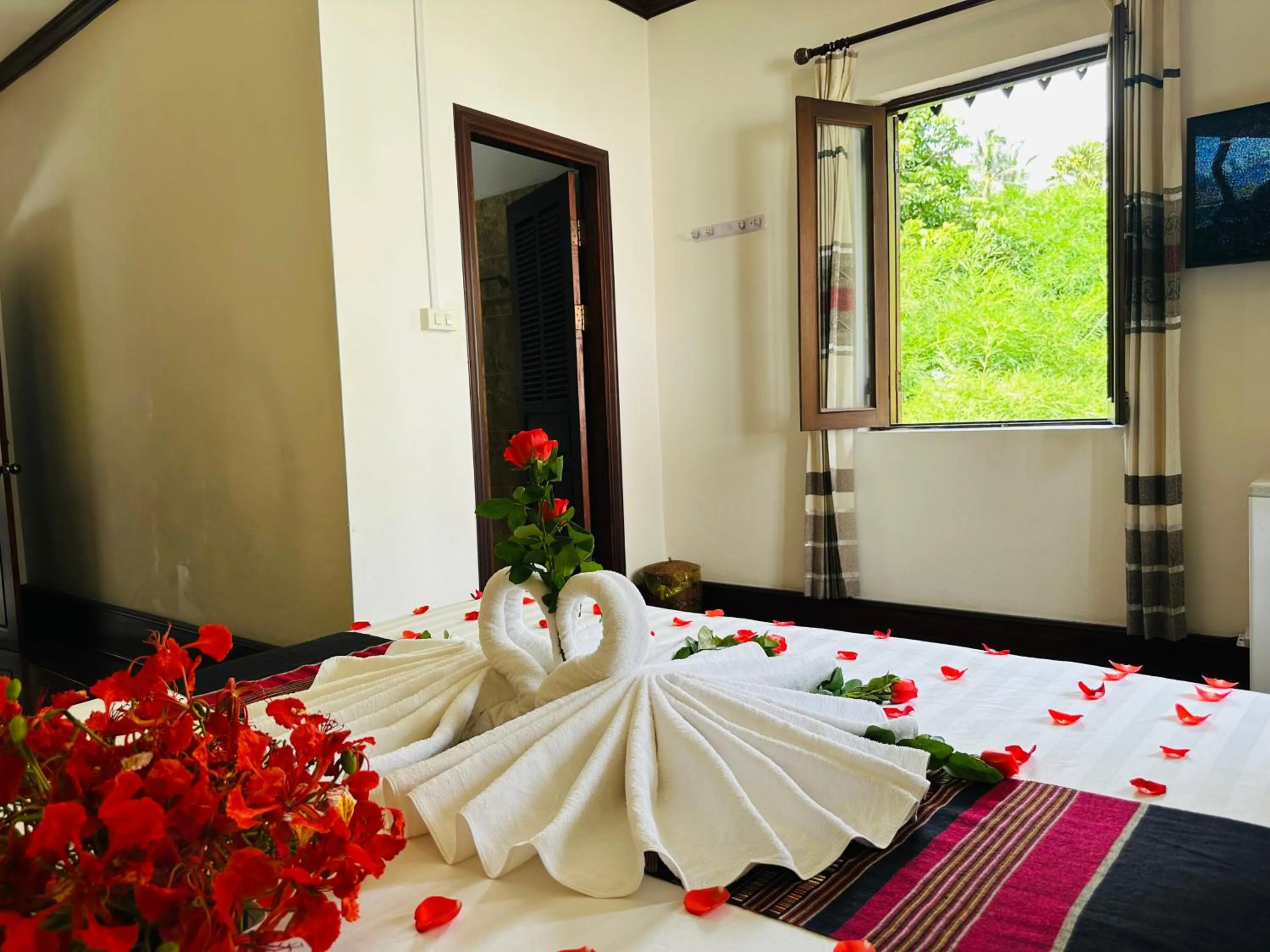 Bed in Thatsaphone Hotel