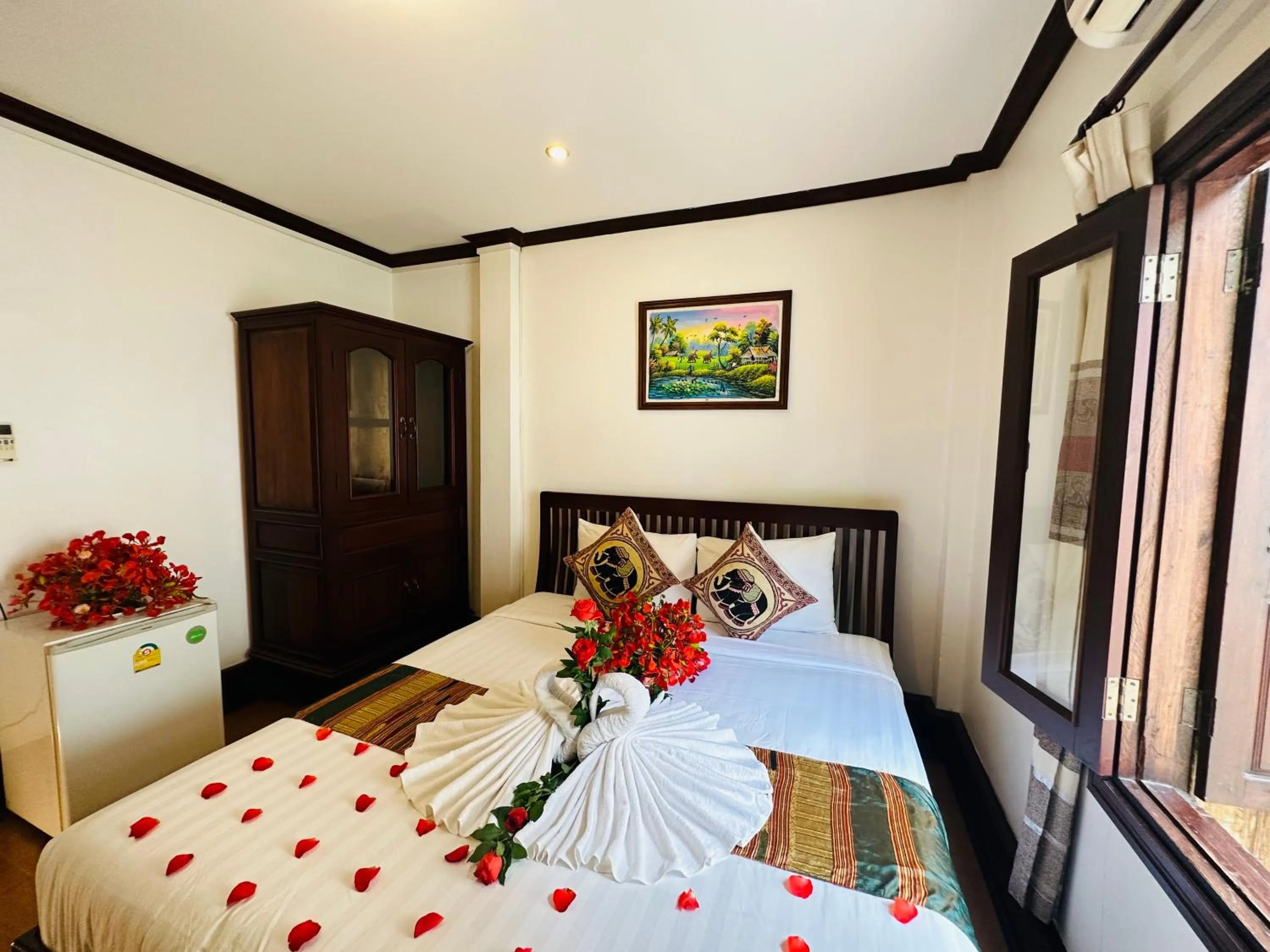 Bed in Thatsaphone Hotel