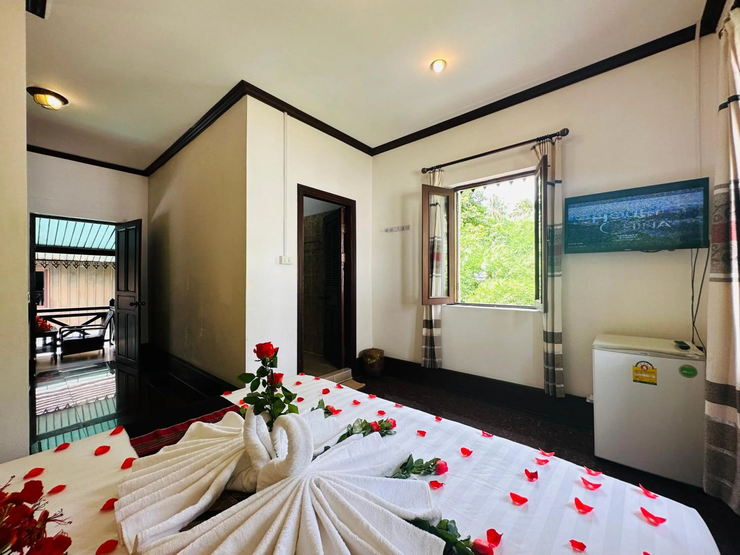 Bed in Thatsaphone Hotel