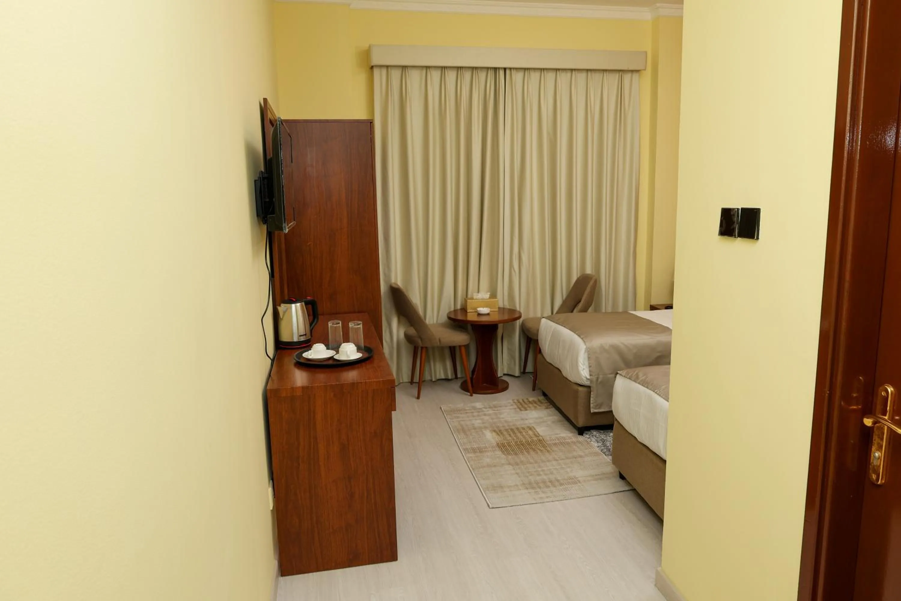 Facade/entrance, Bed in Grand Marino Hotel