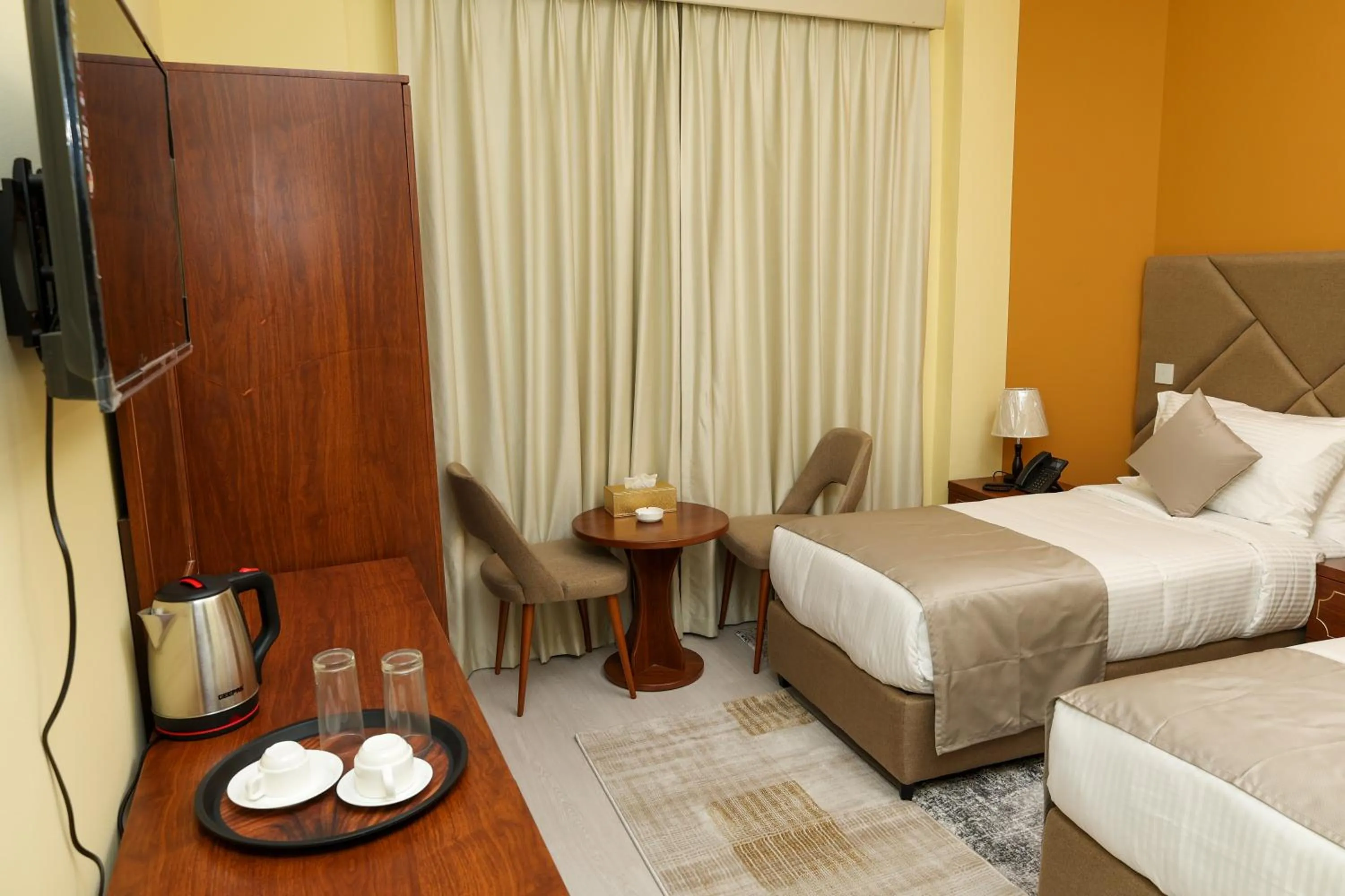 Bed in Grand Marino Hotel