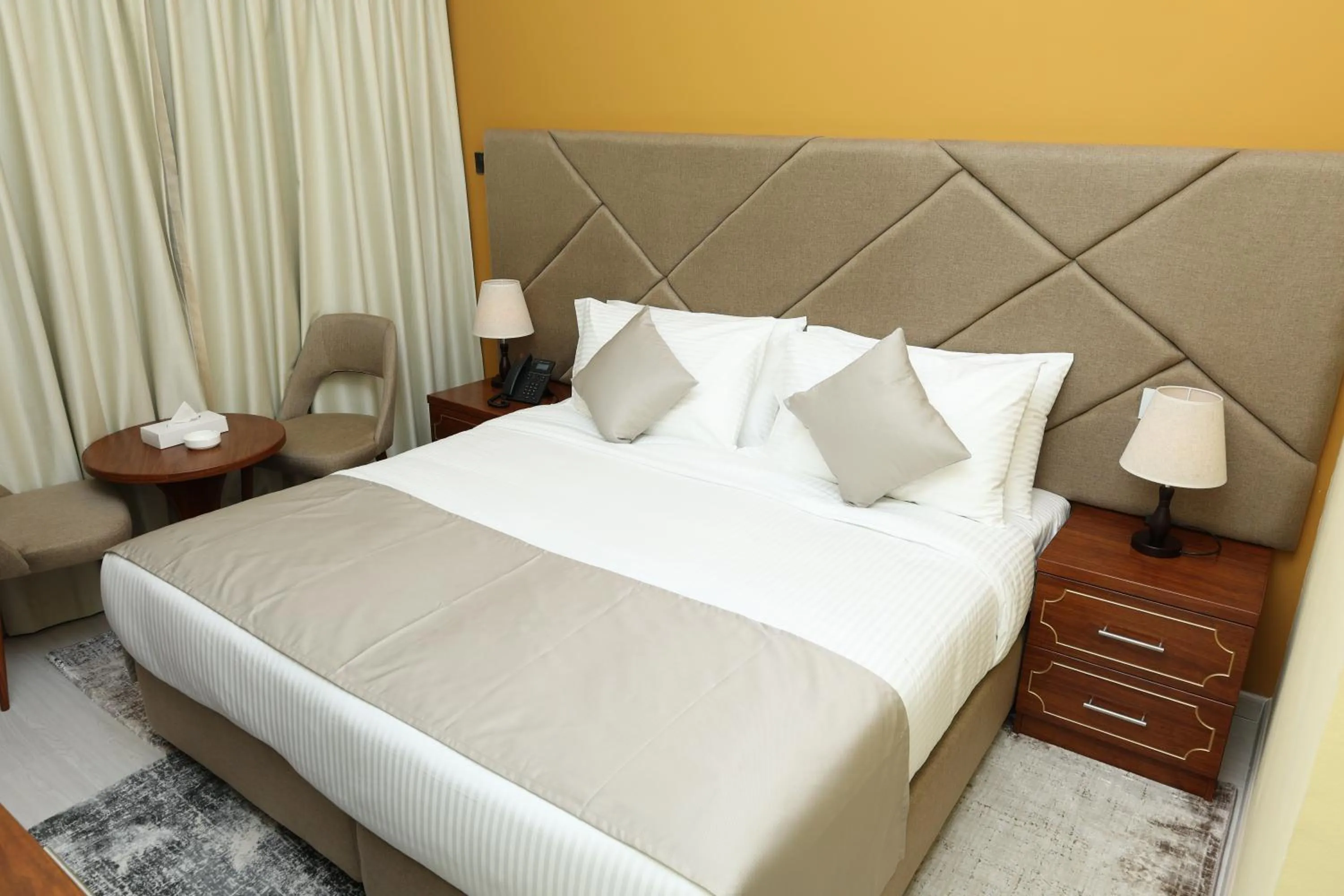 Bed in Grand Marino Hotel