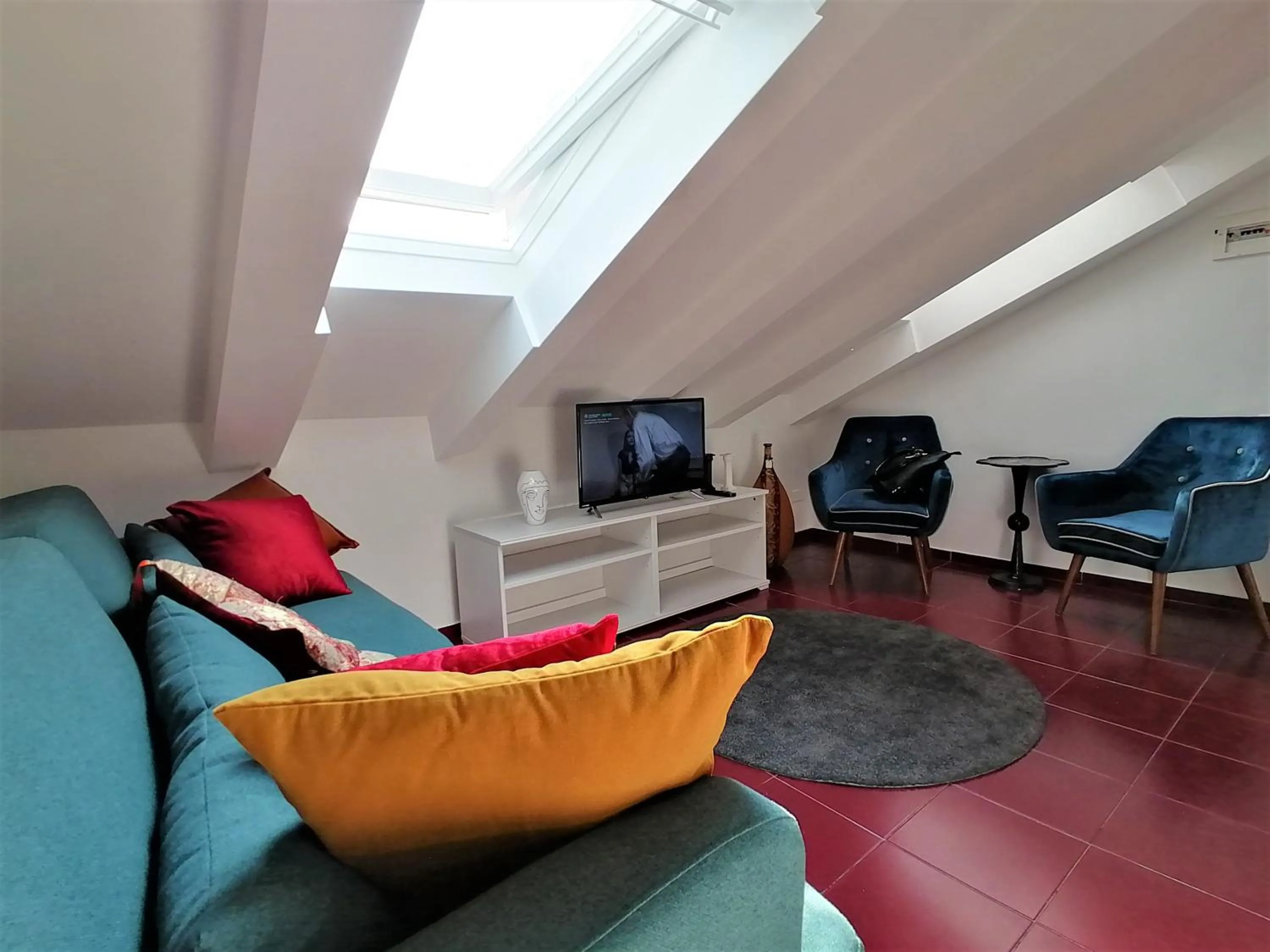 Communal lounge/ TV room in Mercanti Attic Version