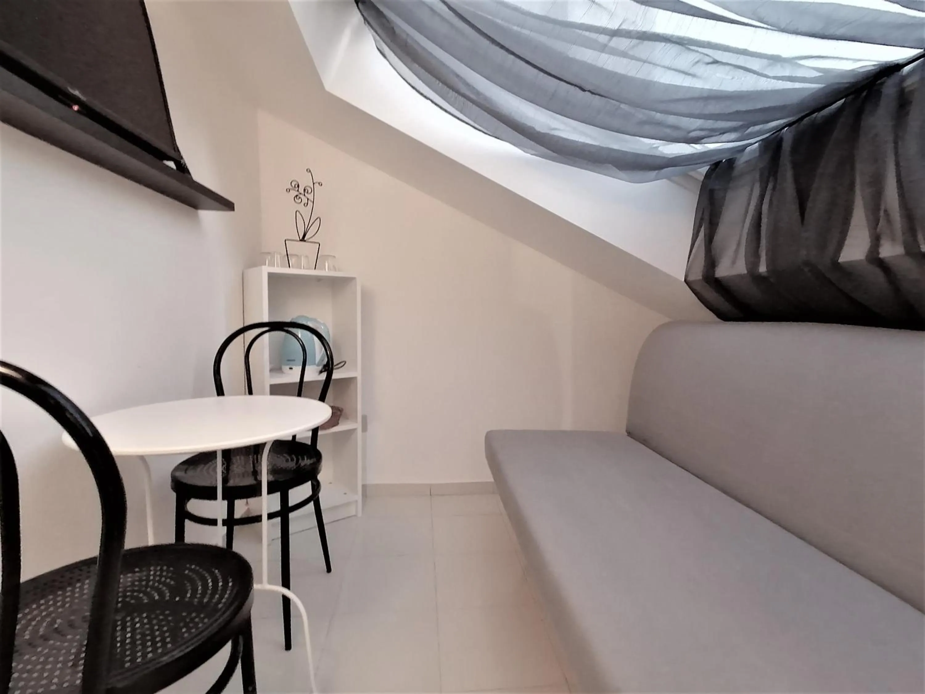 Living room in Mercanti Attic Version