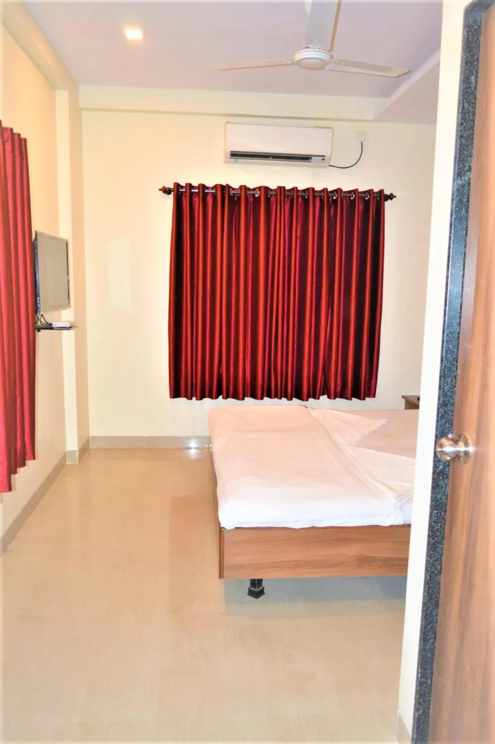 Photo of the whole room, Bed in Hotel Visau,Shirdi