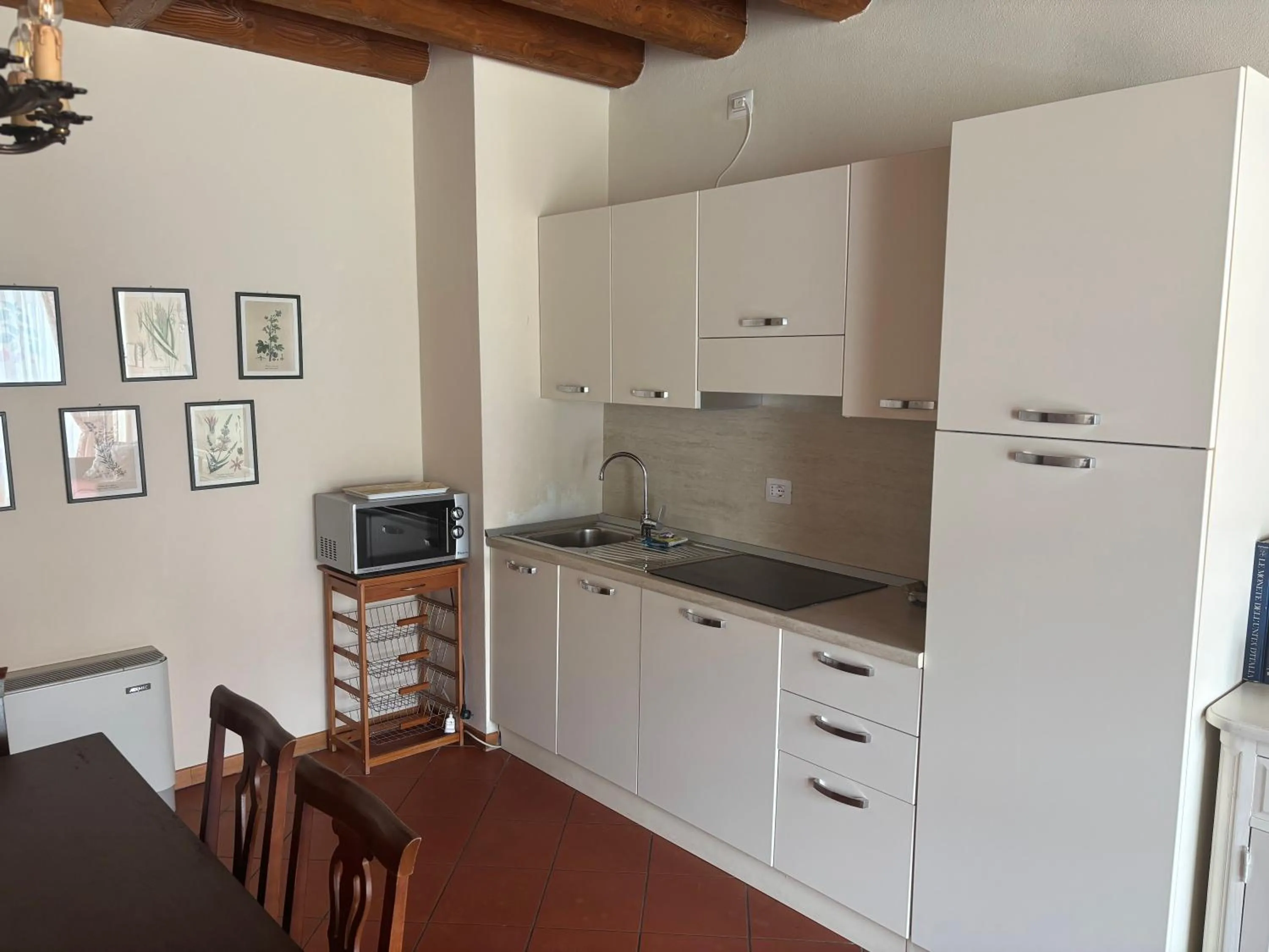 Kitchen or kitchenette in Apartments Relais Corte Paradiso