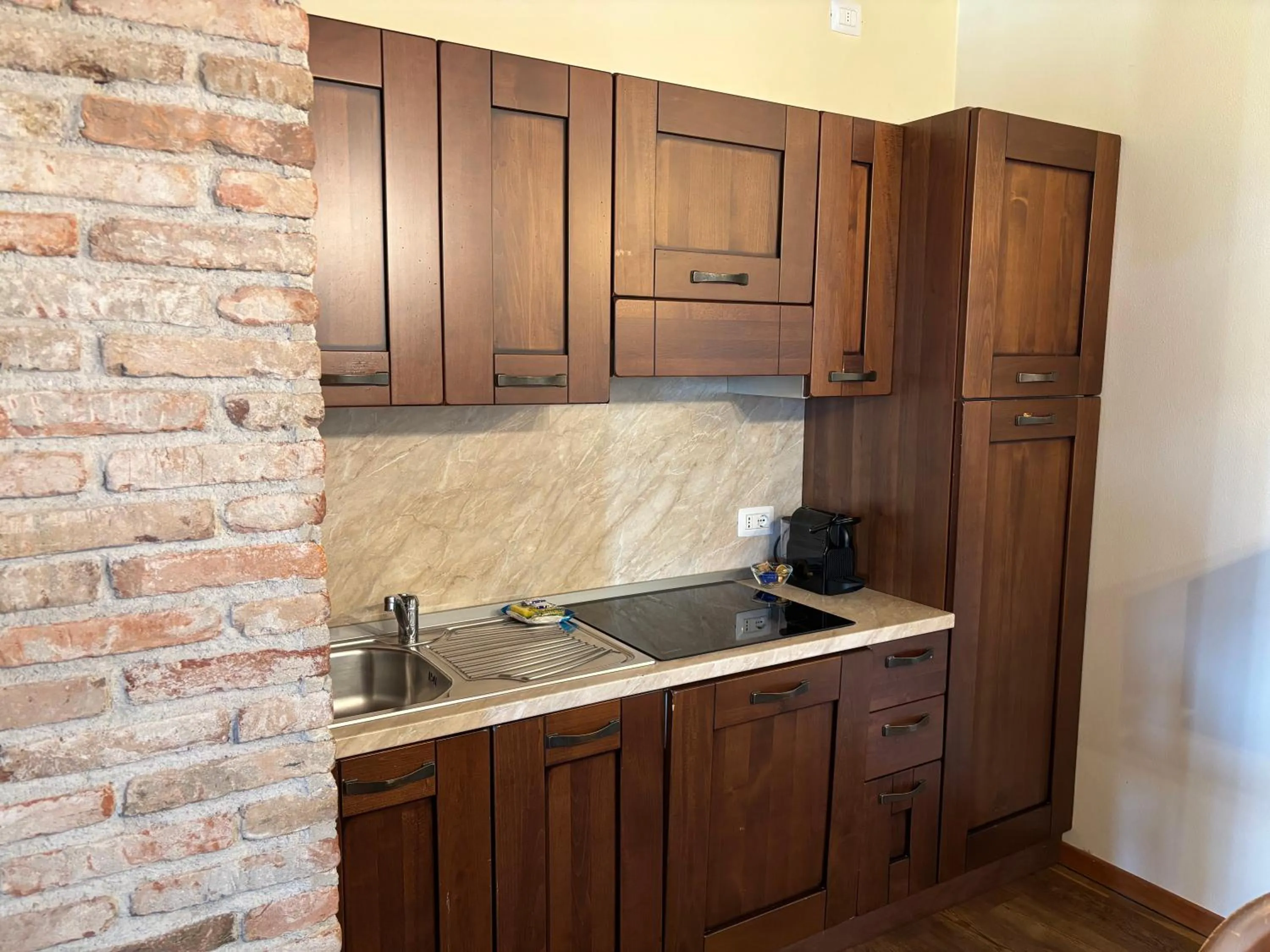 Kitchen or kitchenette in Apartments Relais Corte Paradiso