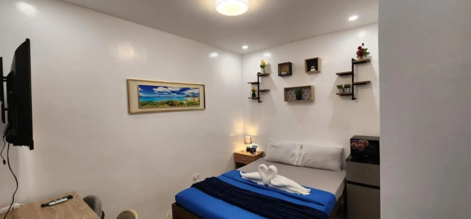 Bed in Bonsai Jacuzzi Suites