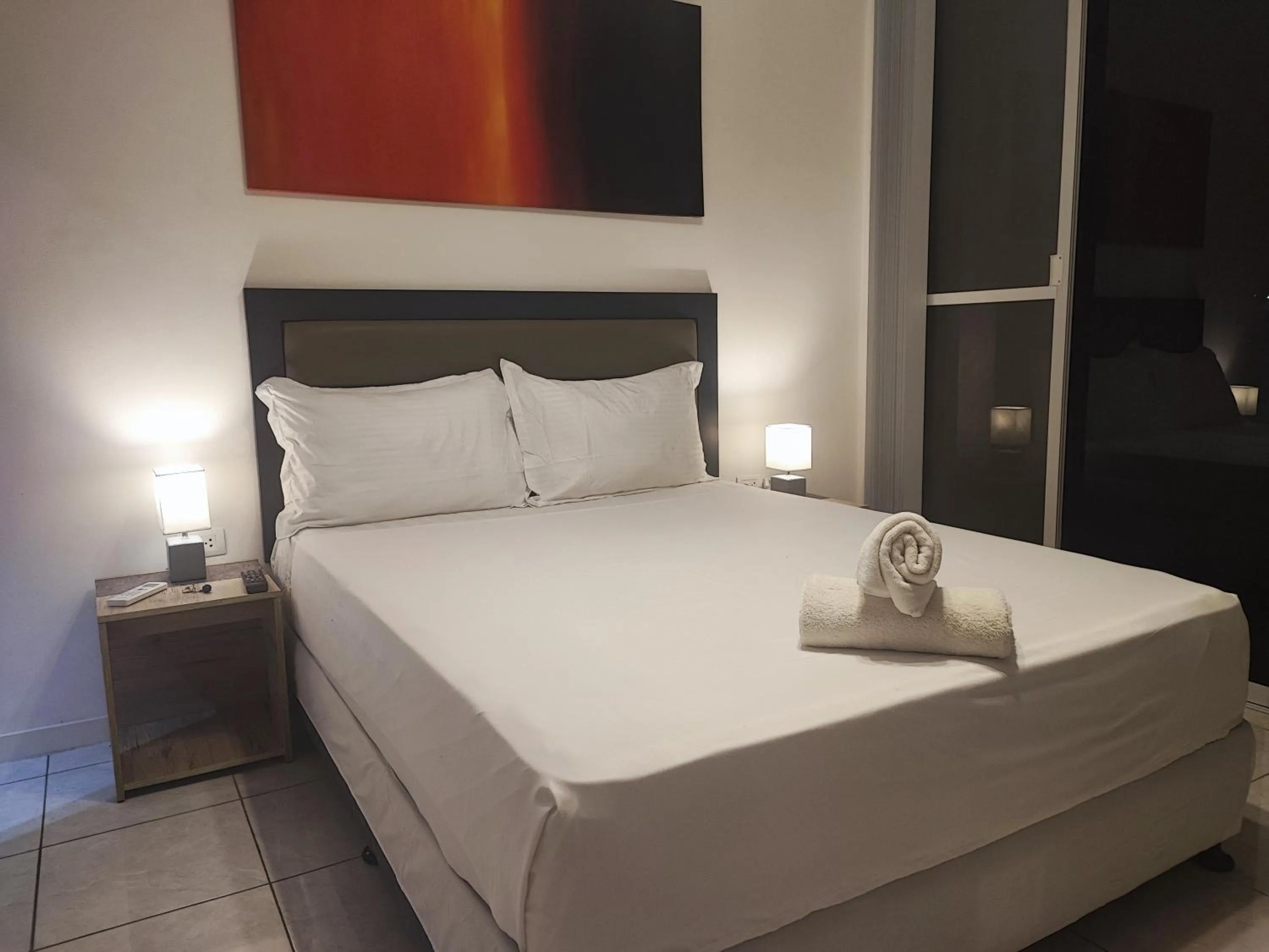 Bed in Bonsai Jacuzzi Suites