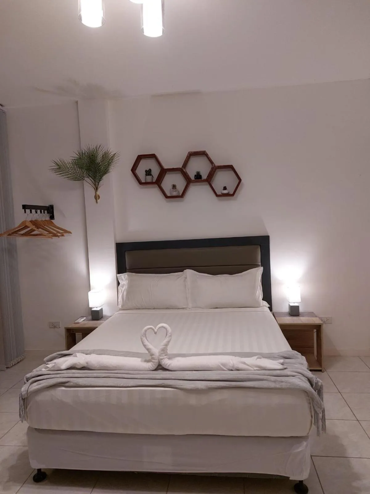 Bed in Bonsai Jacuzzi Suites