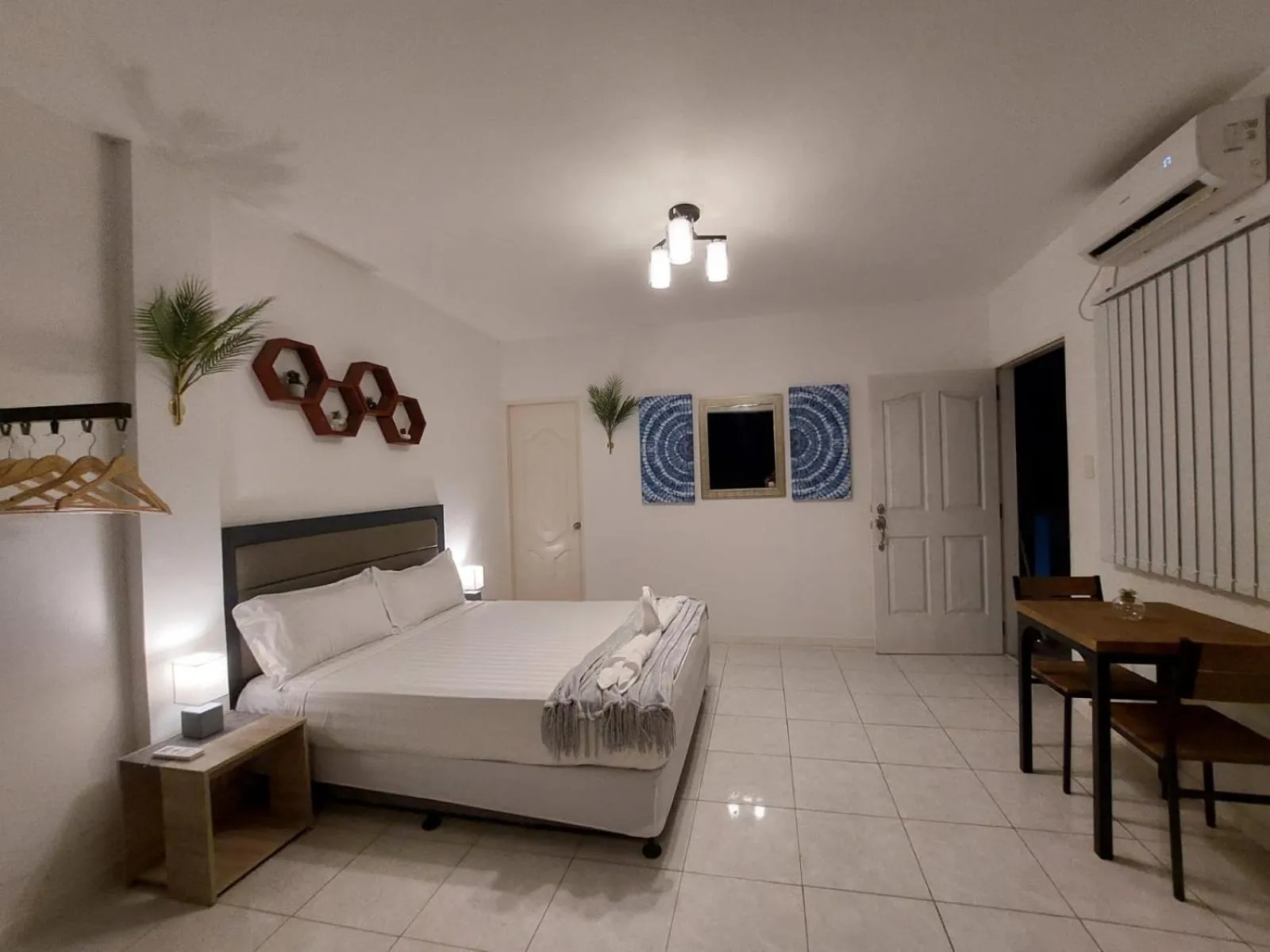 Bed in Bonsai Jacuzzi Suites