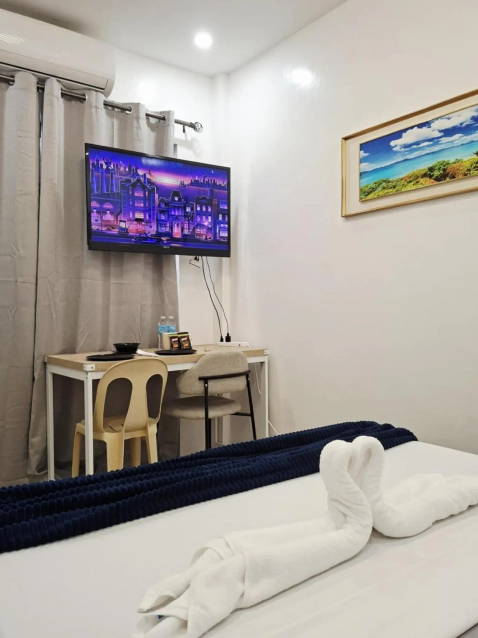 Bed in Bonsai Jacuzzi Suites