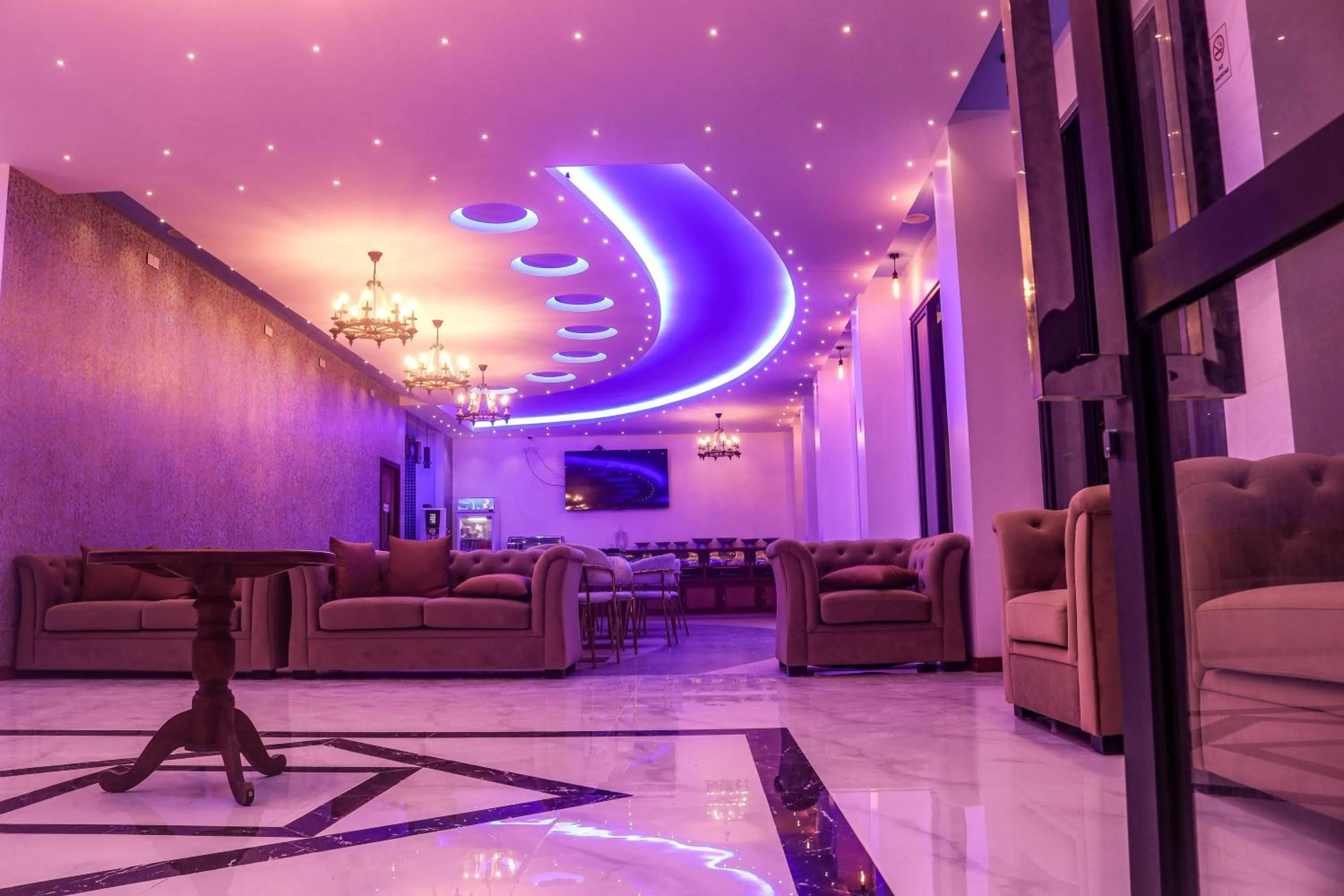 Communal lounge/ TV room in Ari Grand Hotel & Spa