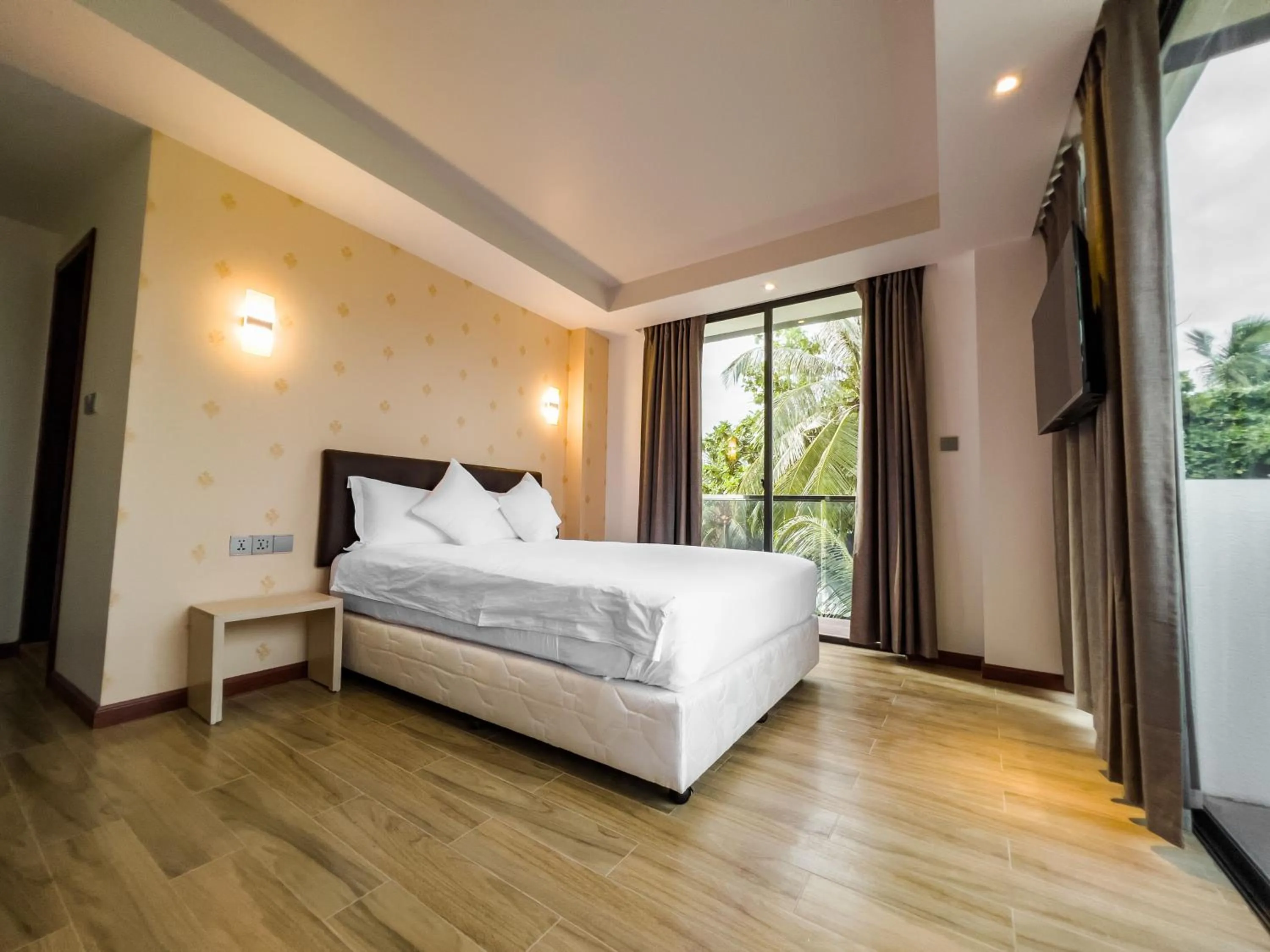 Bed in Ari Grand Hotel & Spa