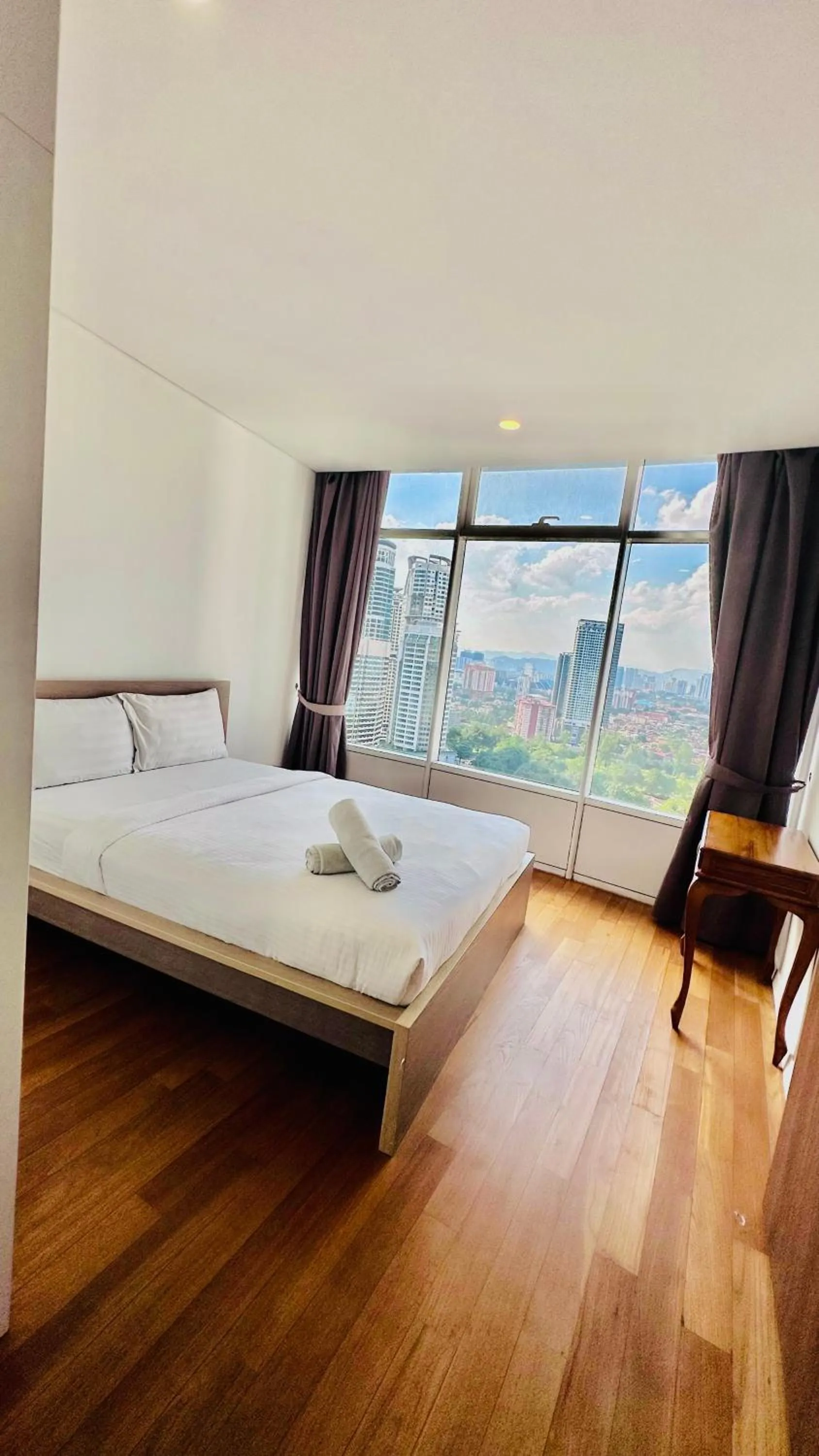 Bed in Vortex KLCC suites by Cityboxz