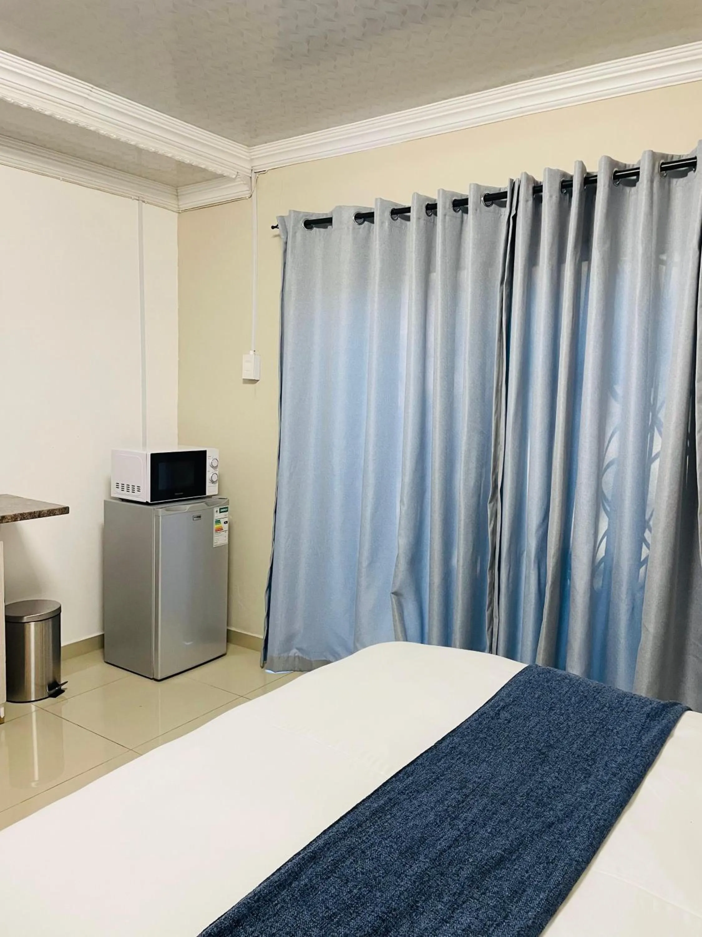 Bed in The Success Guest House