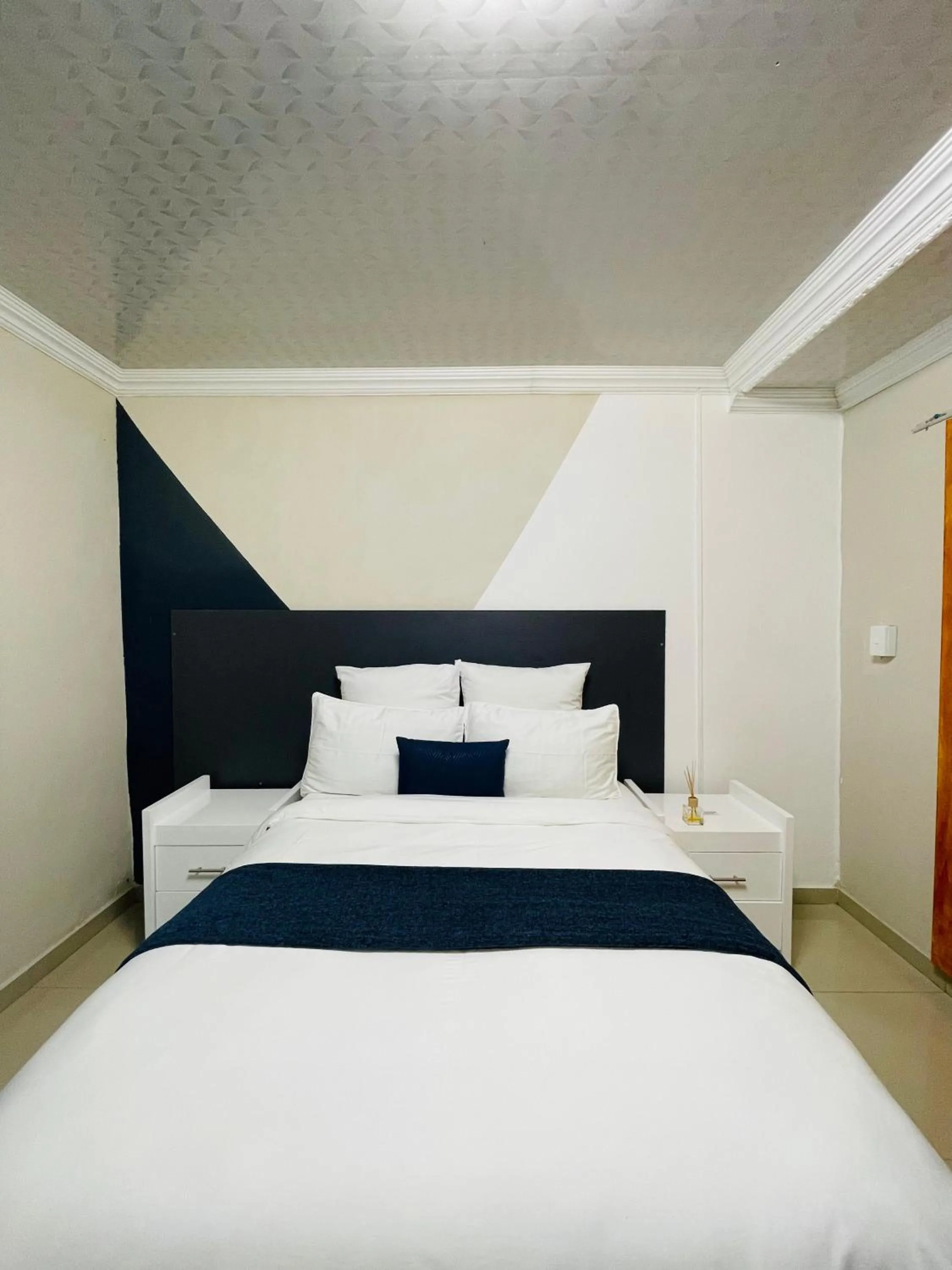 Bed in The Success Guest House