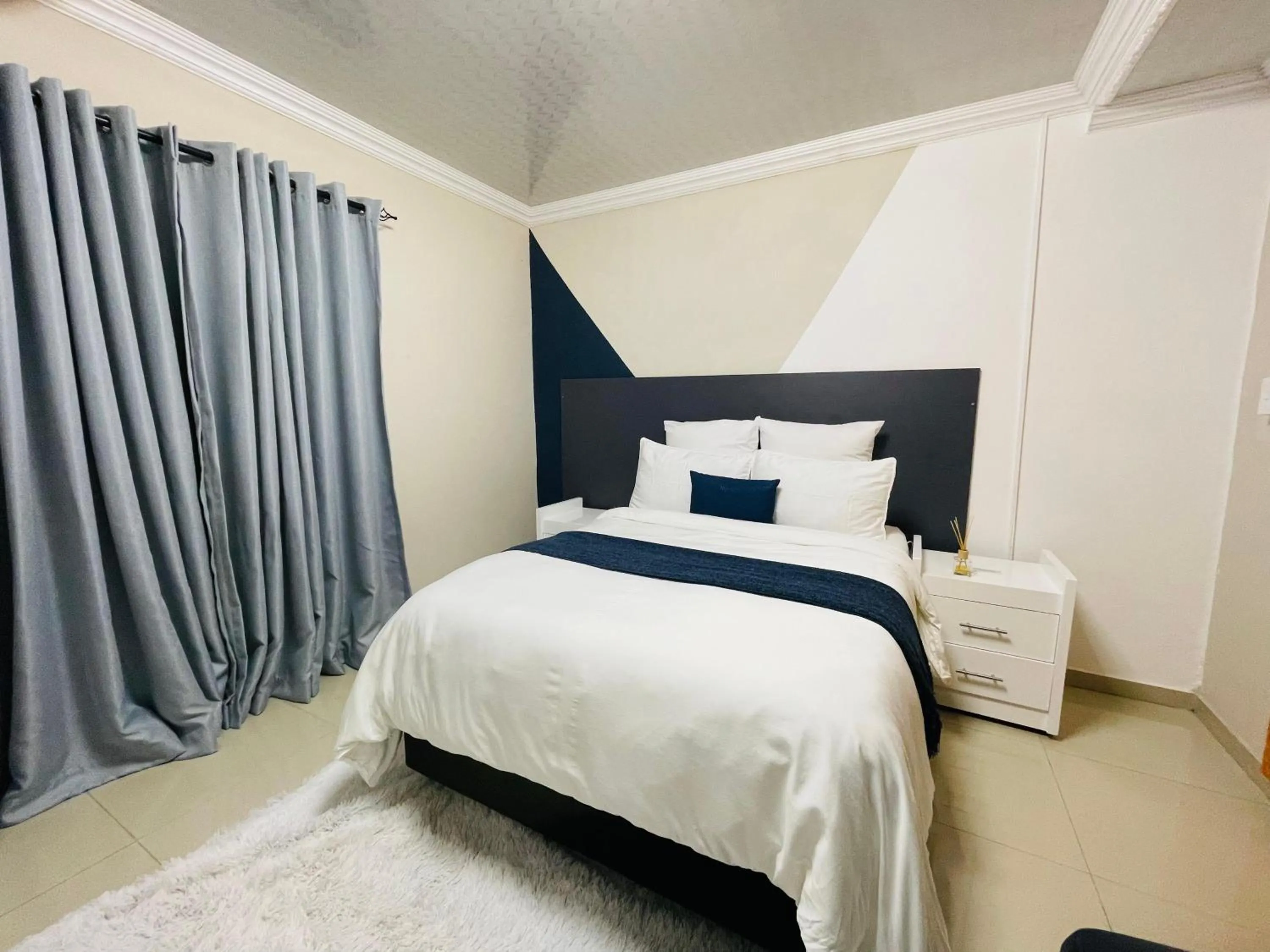 Bed in The Success Guest House