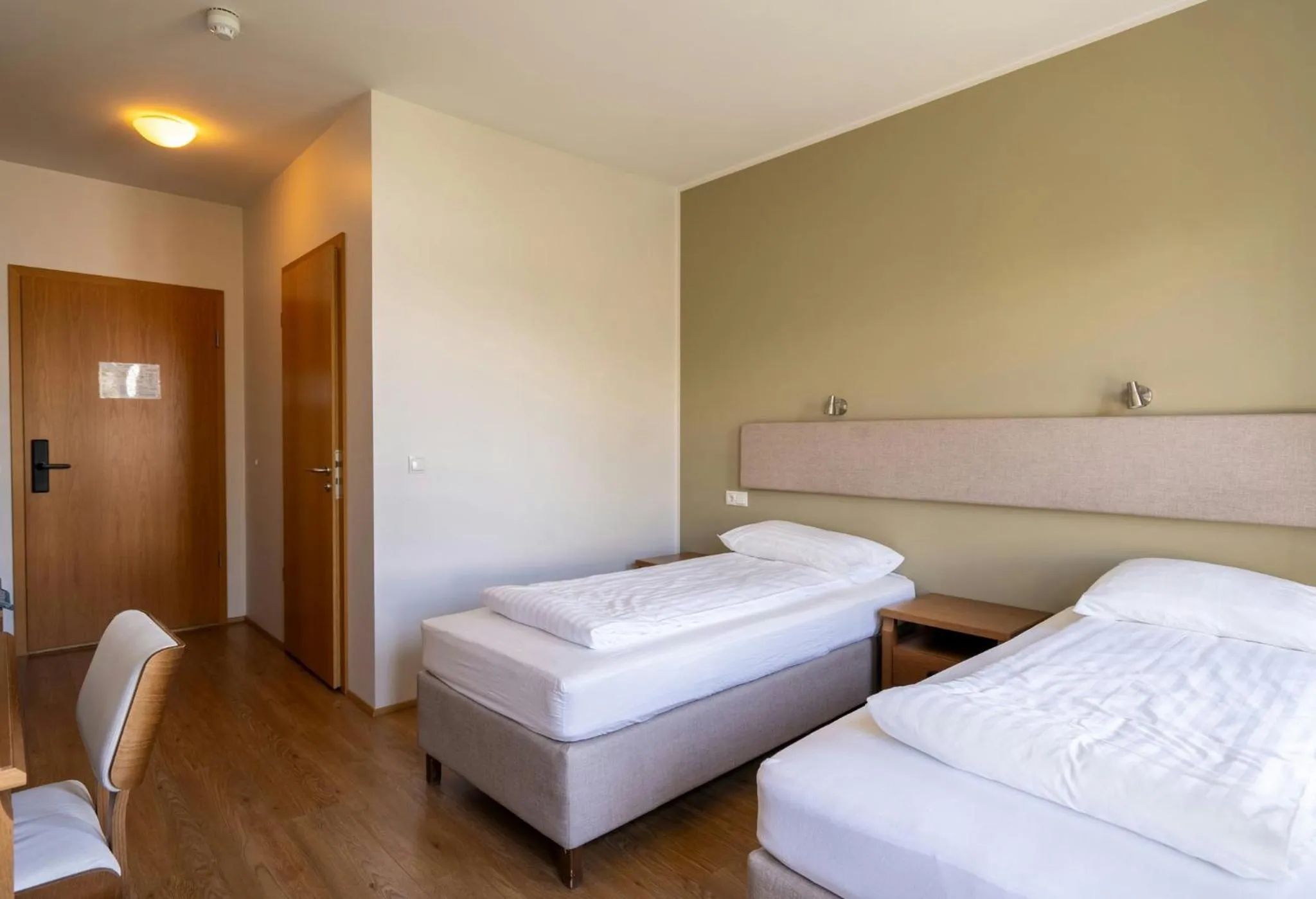 Bedroom, Bed in Gistihúsið - Lake Hotel Egilsstadir