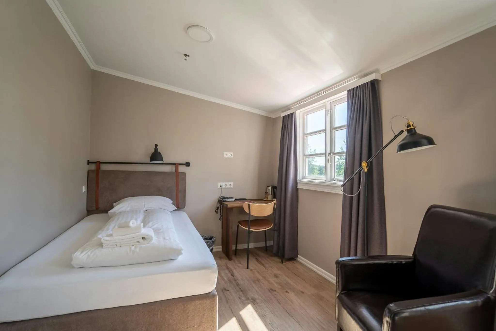 Bedroom, Bed in Gistihúsið - Lake Hotel Egilsstadir