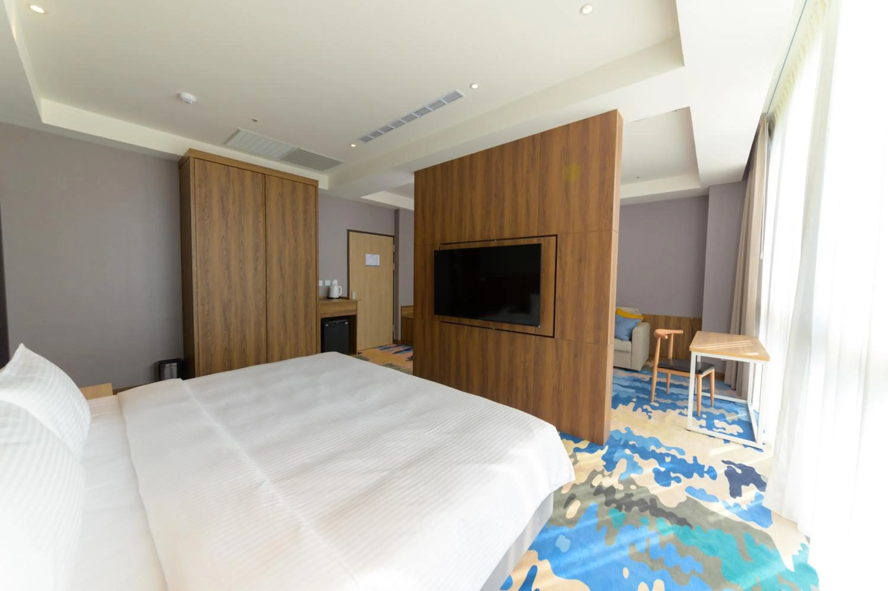 Bed in JANDA Golden Tulip Hotel