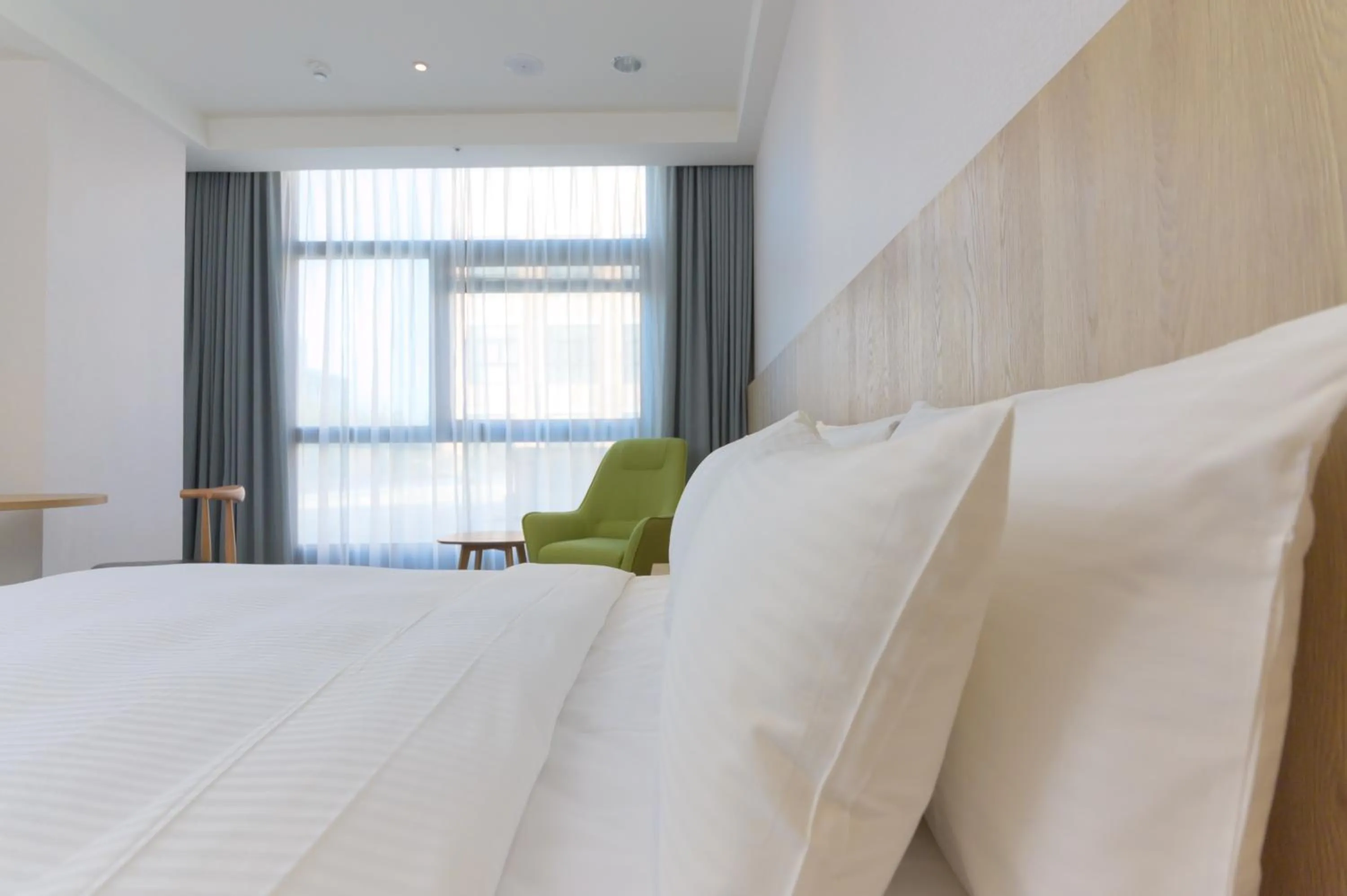 Bed in JANDA Golden Tulip Hotel