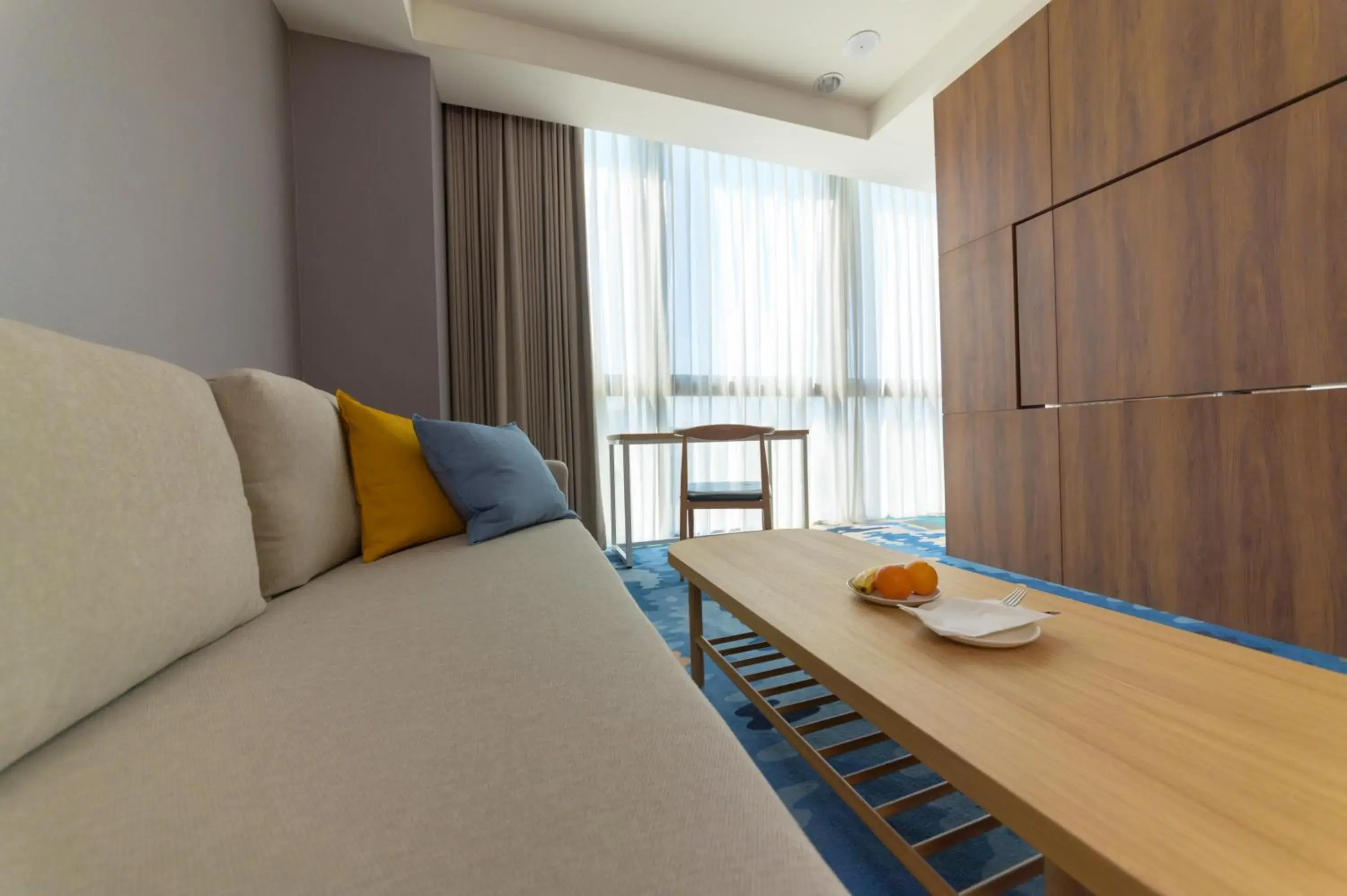 Living room, Bed in JANDA Golden Tulip Hotel Living room, Bed in JANDA Golden Tulip Hotel