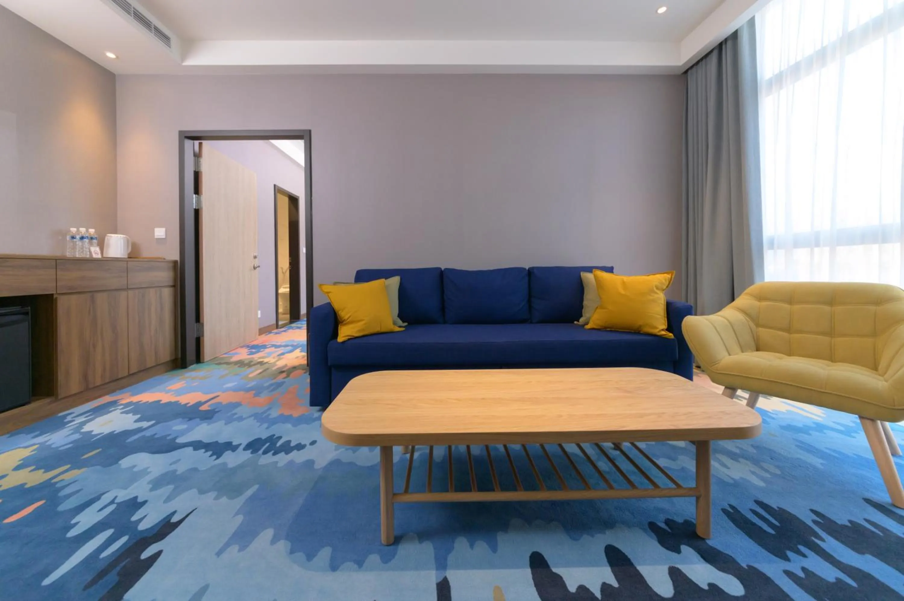 Living room in JANDA Golden Tulip Hotel