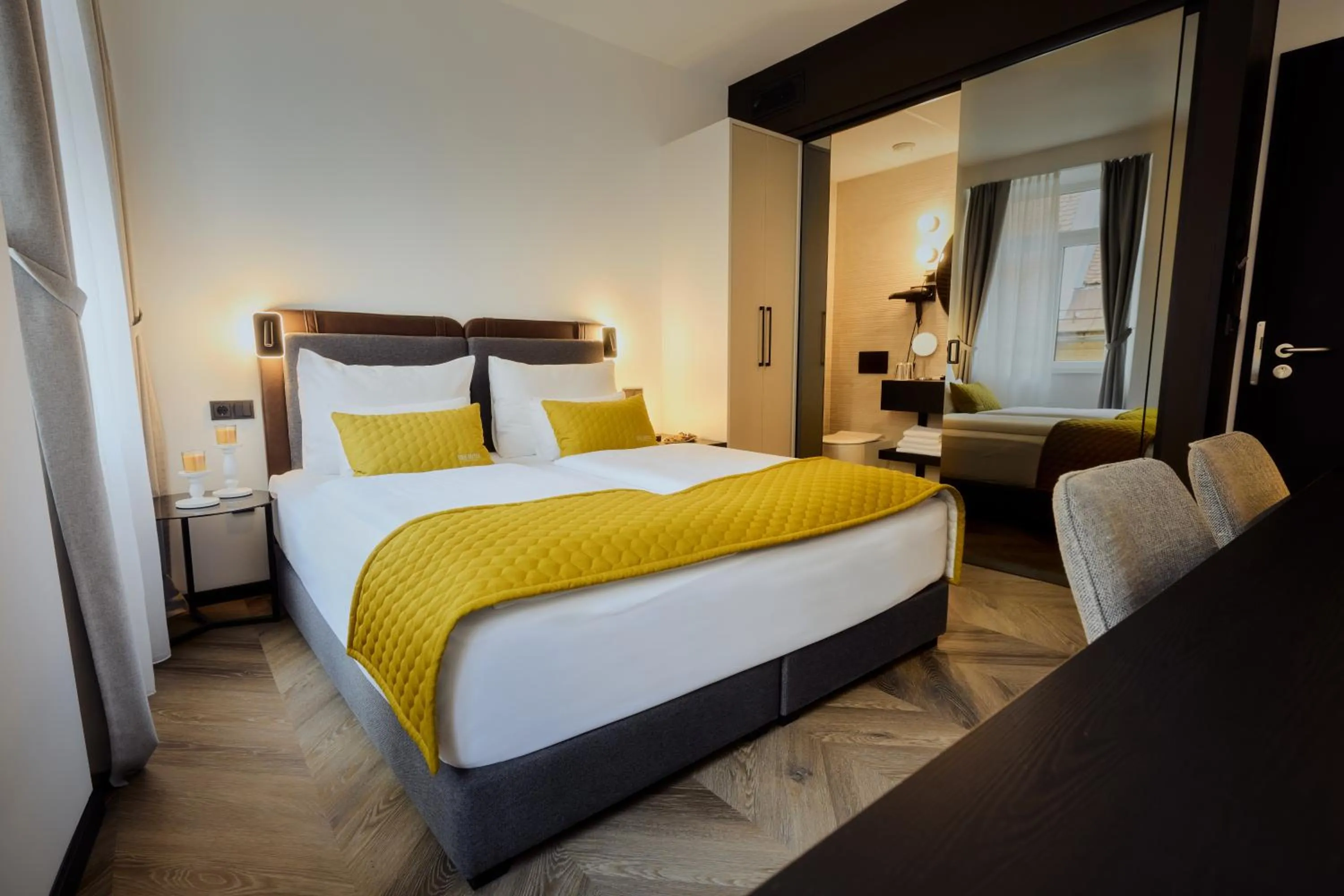 Bed in The Hotel Ljubljana