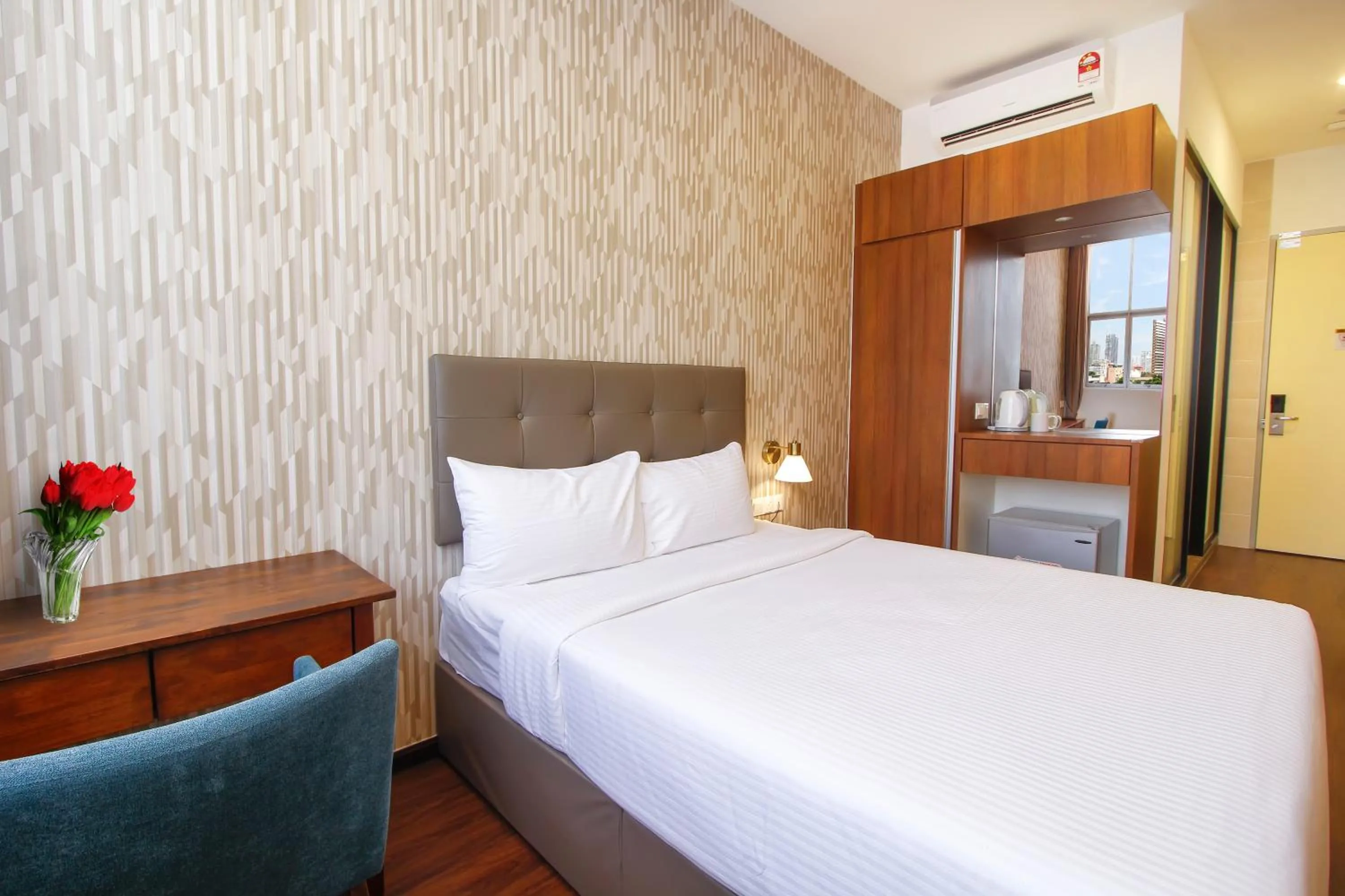 Bed in CitiVilla Hotel Penang