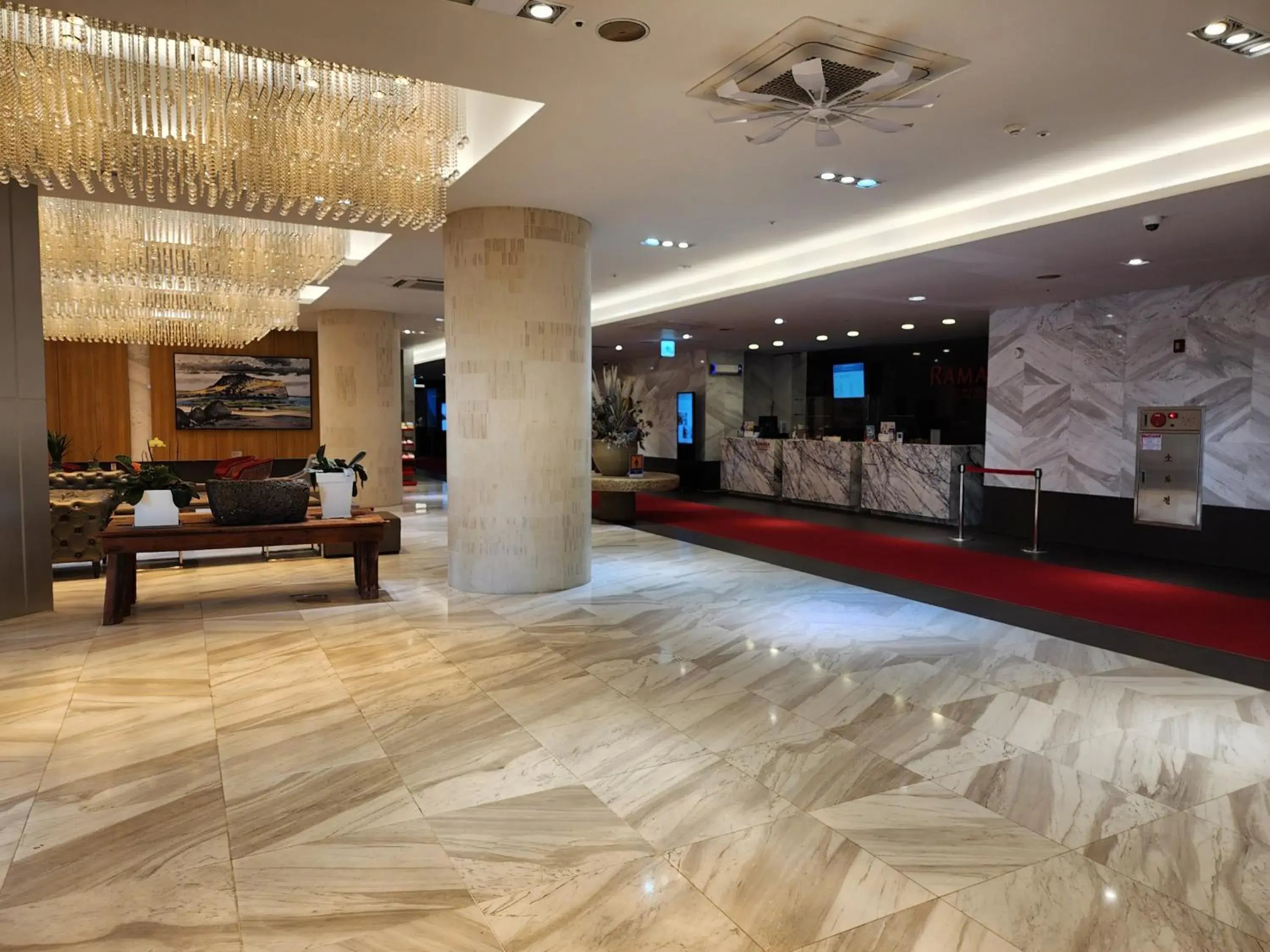 Lobby or reception in Ramada by Wyndham Jeju Hamdeok Lobby or reception in Ramada by Wyndham Jeju Hamdeok
