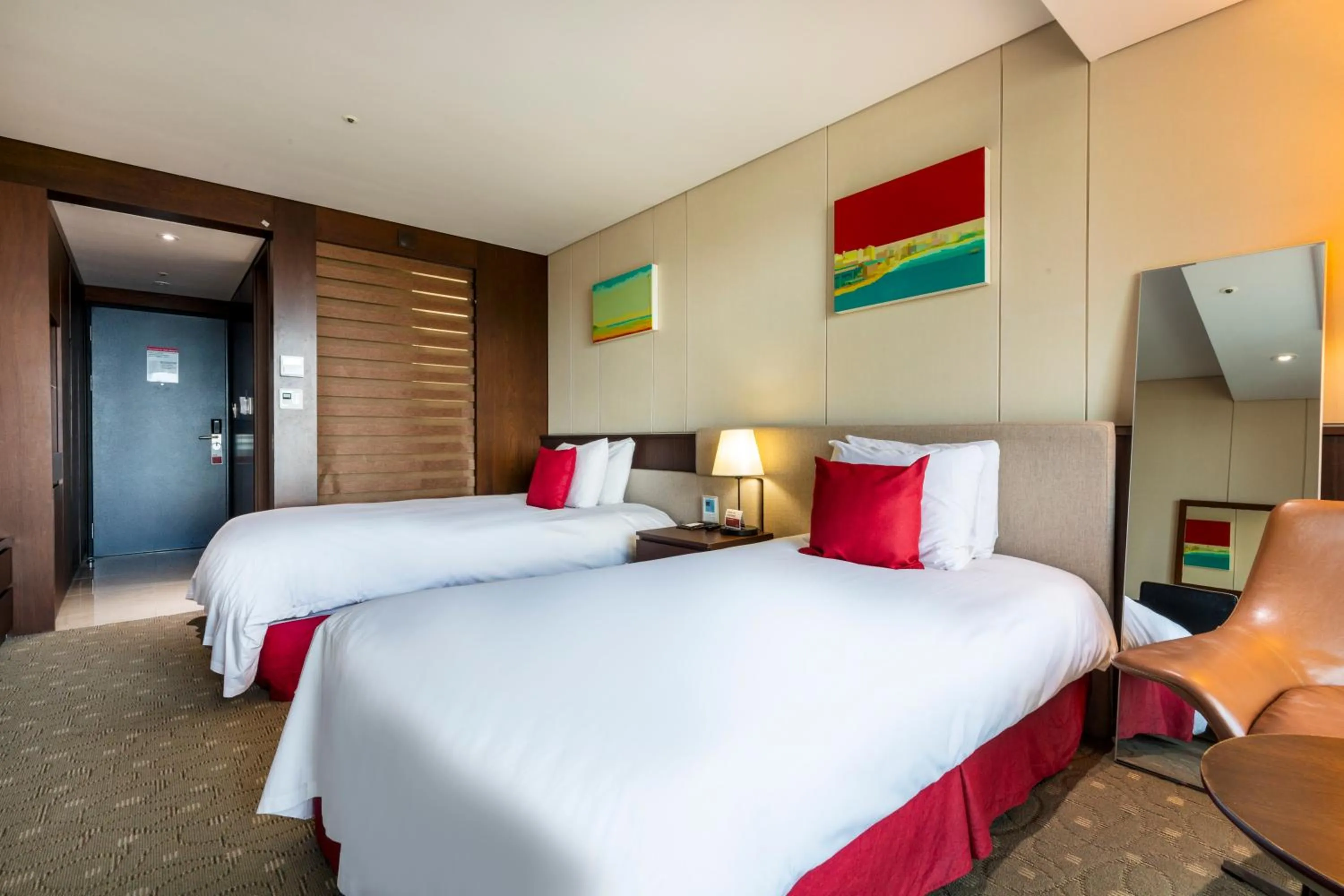 Bed in Ramada by Wyndham Jeju Hamdeok