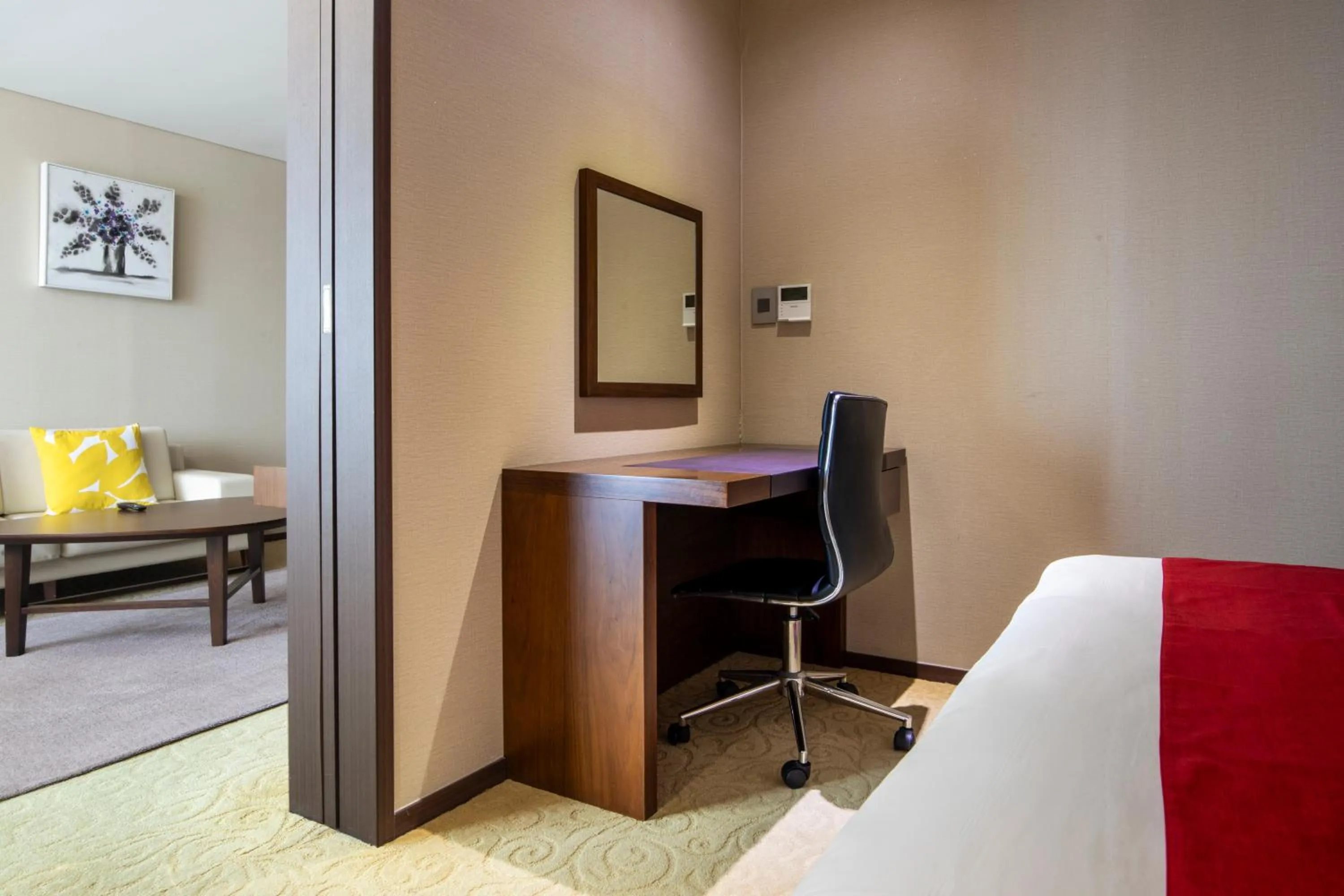 Bed in Ramada by Wyndham Jeju Hamdeok