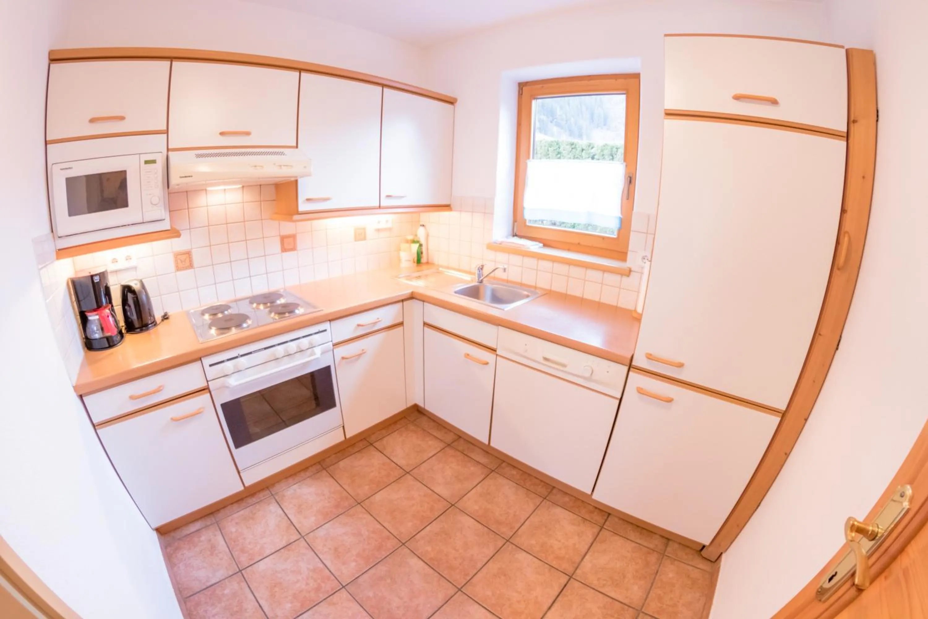 Kitchen or kitchenette in Landhaus Alpenrose