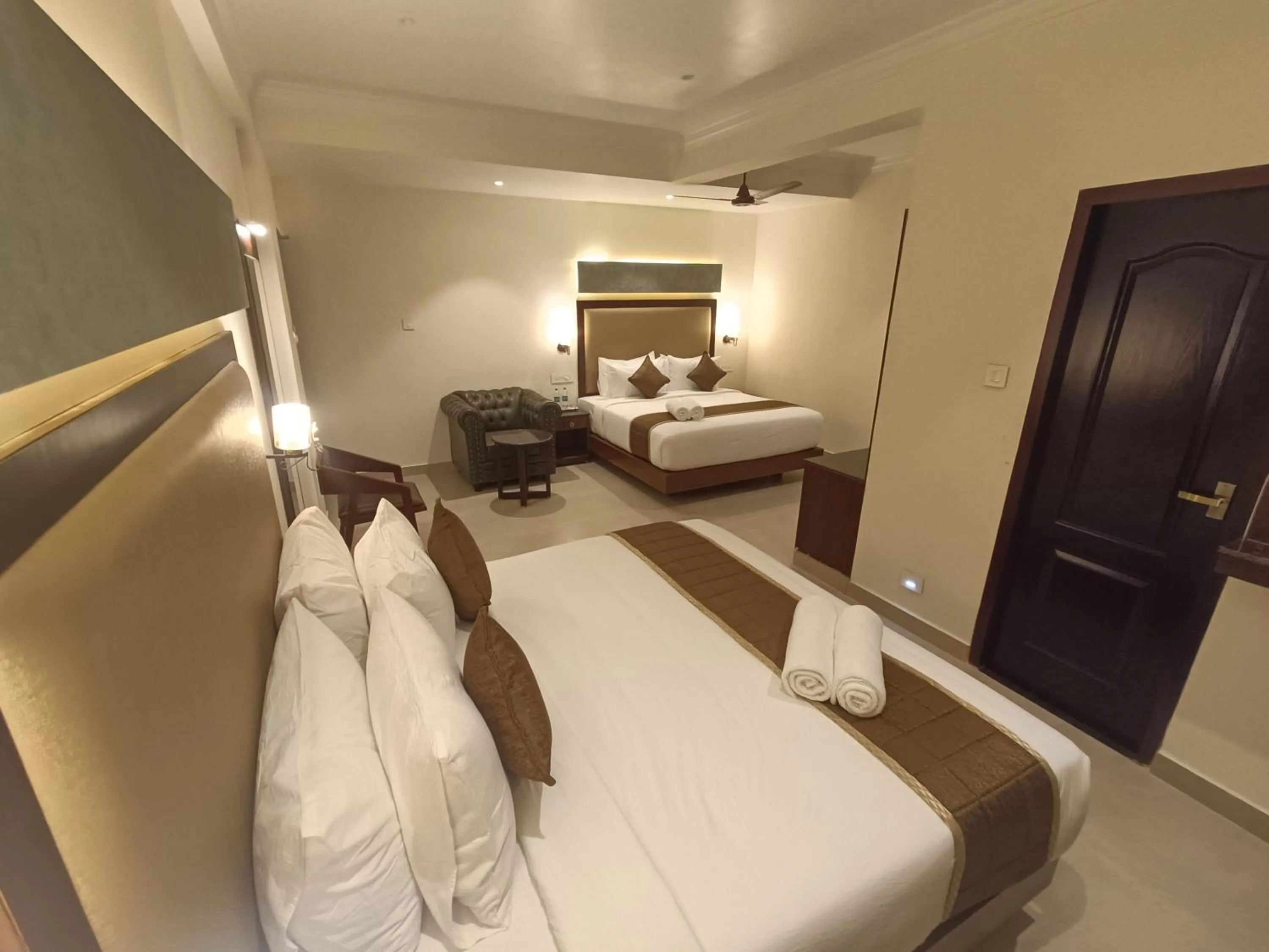 Bed in Hotel Comorin Grand