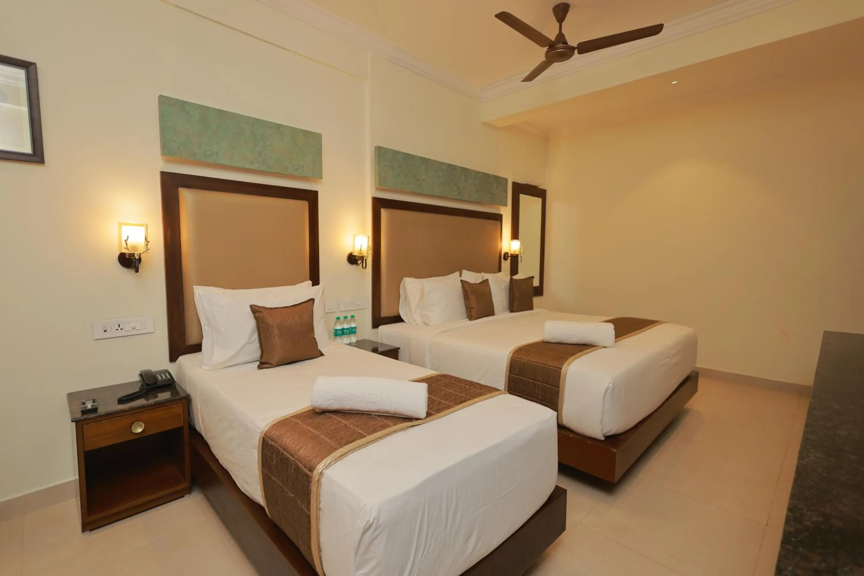 Bed in Hotel Comorin Grand