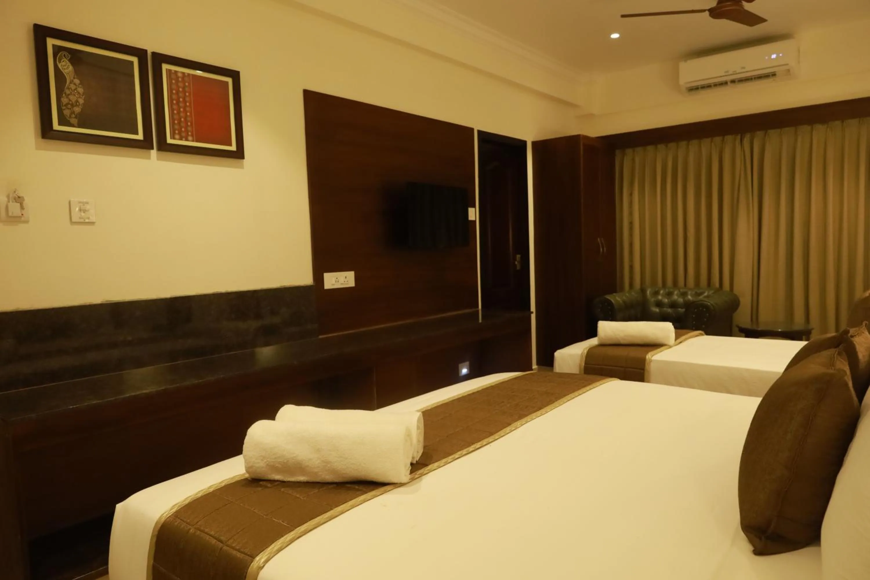 Bed in Hotel Comorin Grand