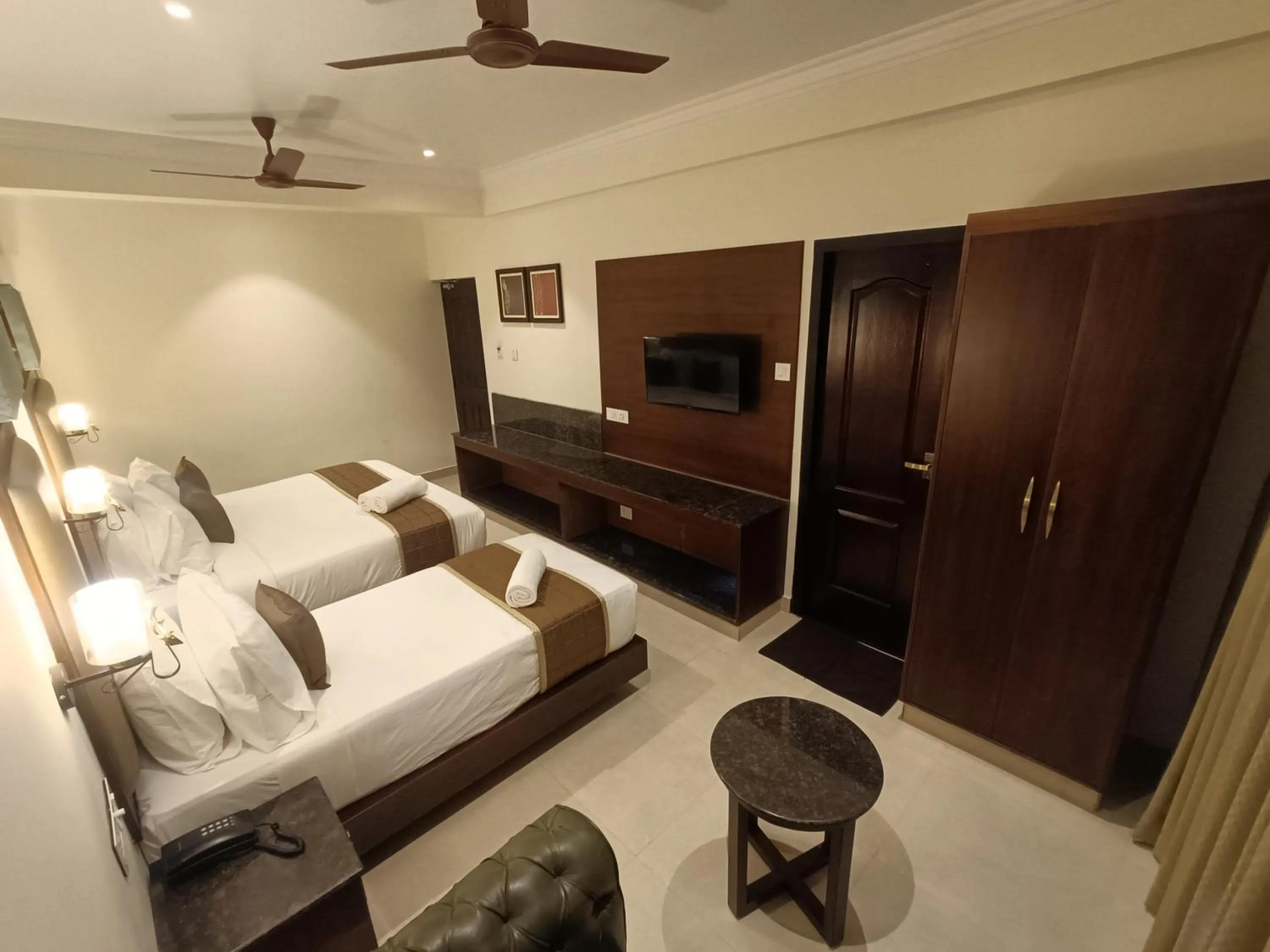 Bed in Hotel Comorin Grand