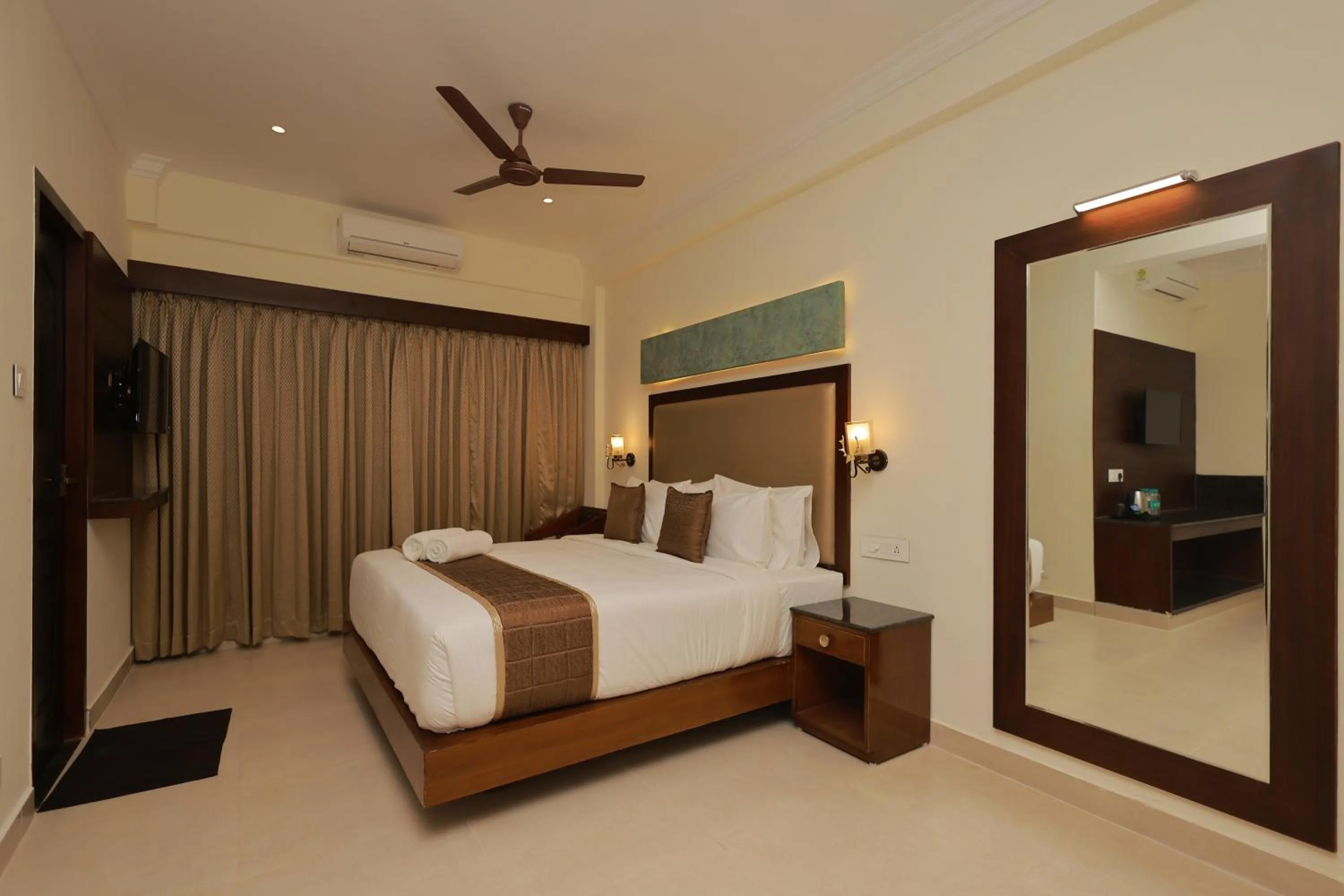 Bed in Hotel Comorin Grand