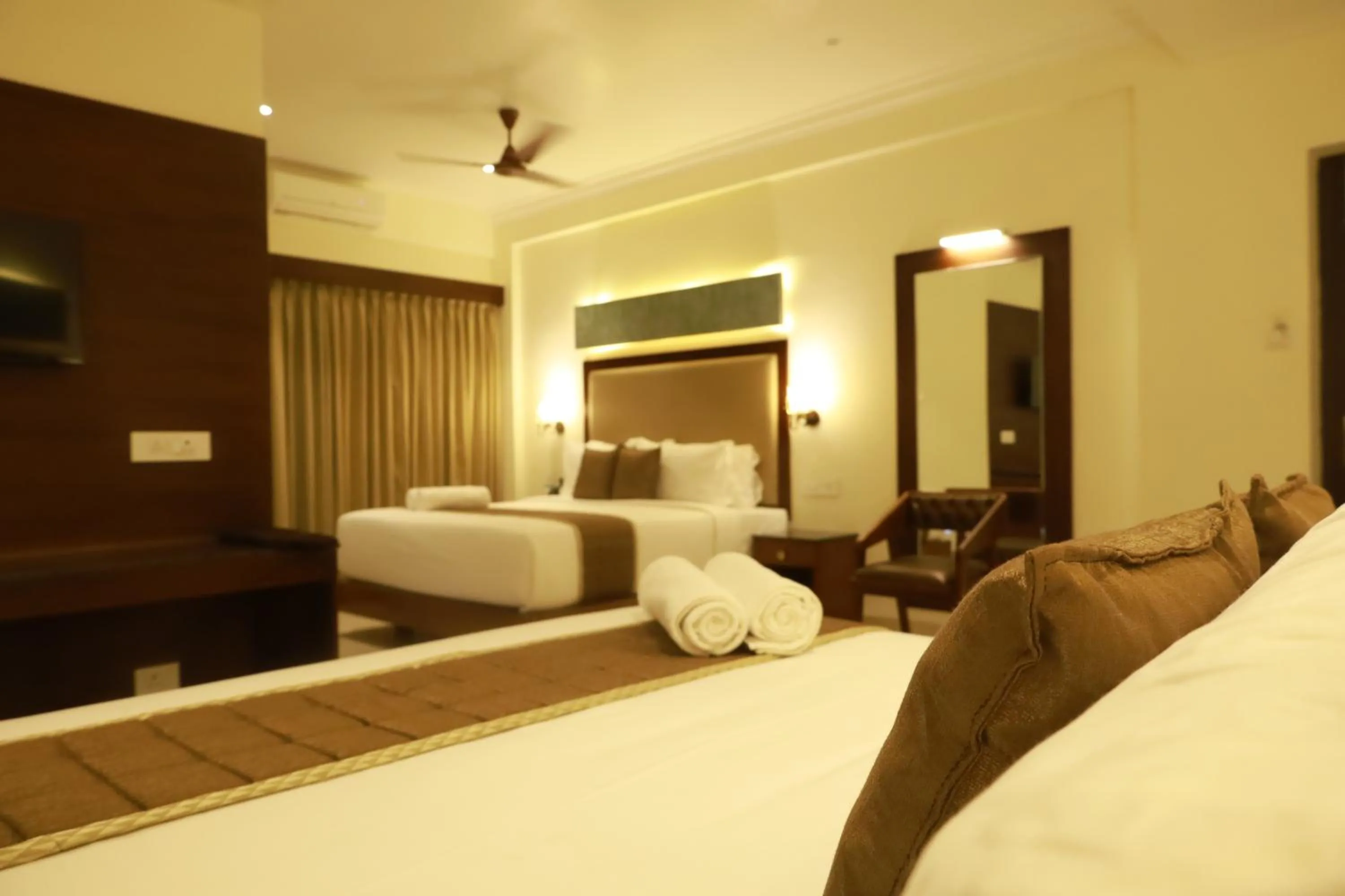 Bed in Hotel Comorin Grand