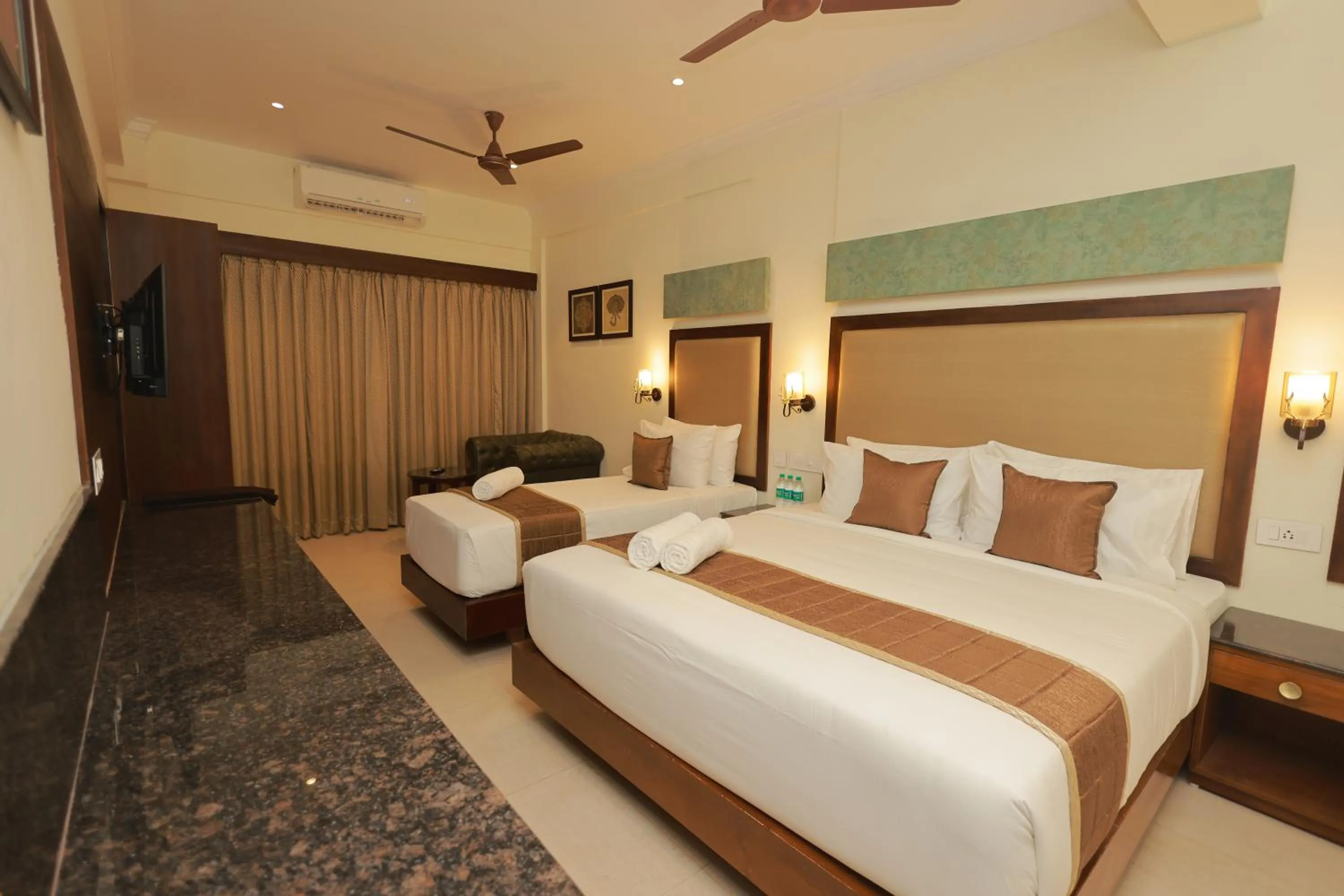 Bed in Hotel Comorin Grand