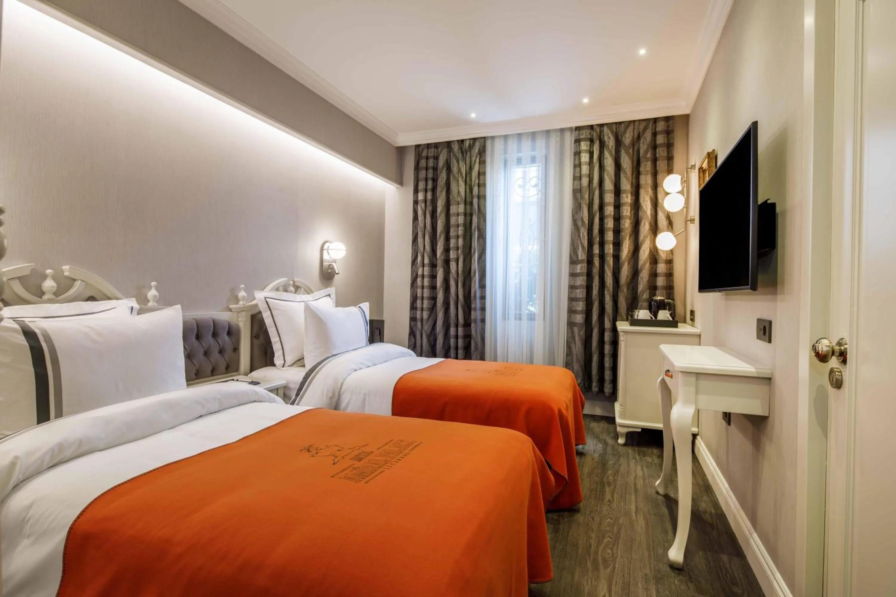 Bed in Amiral Palace Hotel Boutique Class